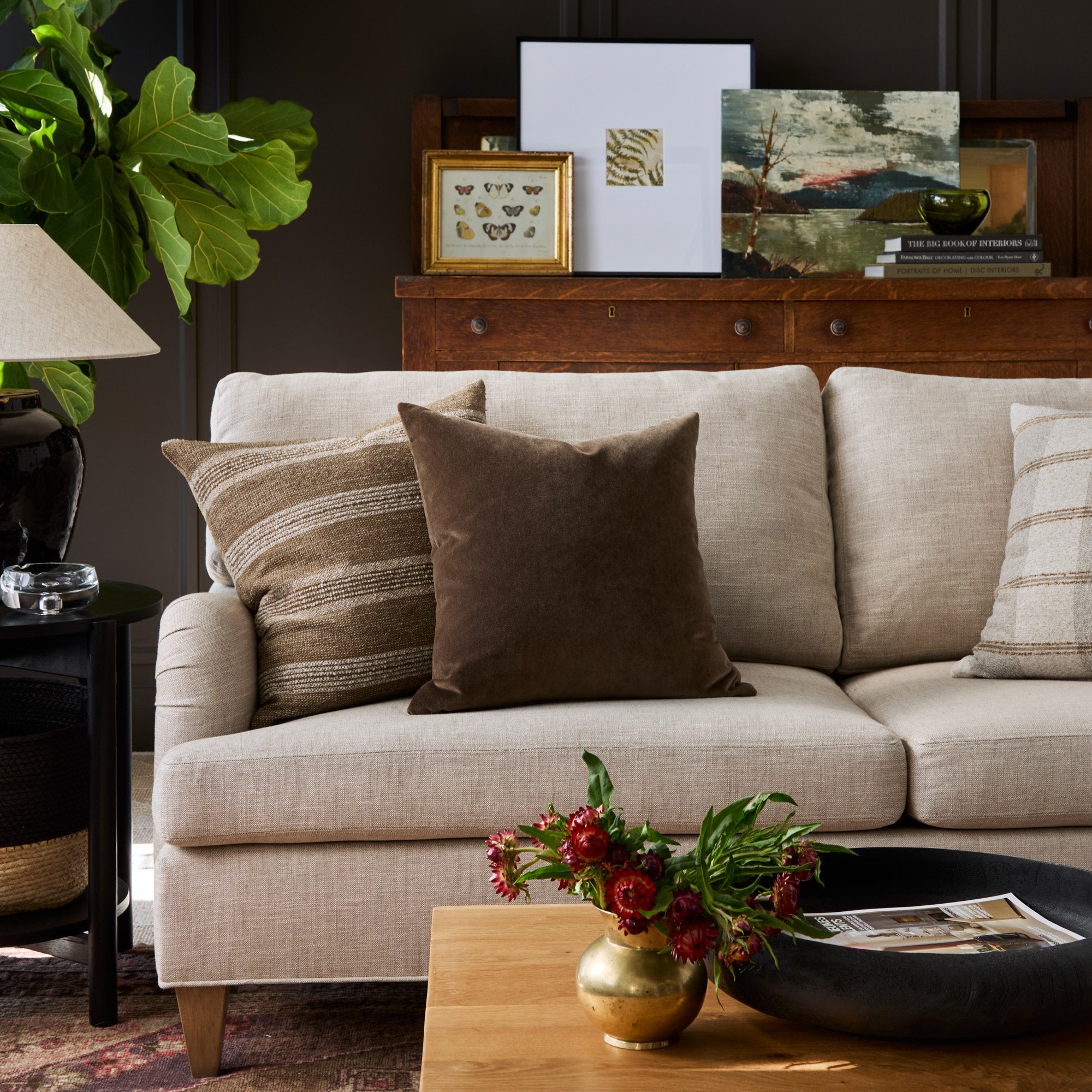 Living room with Acadia Stripe cinnamon brown and Valentina Velvet dark brown pillows styled on a sofa – Tonic Living