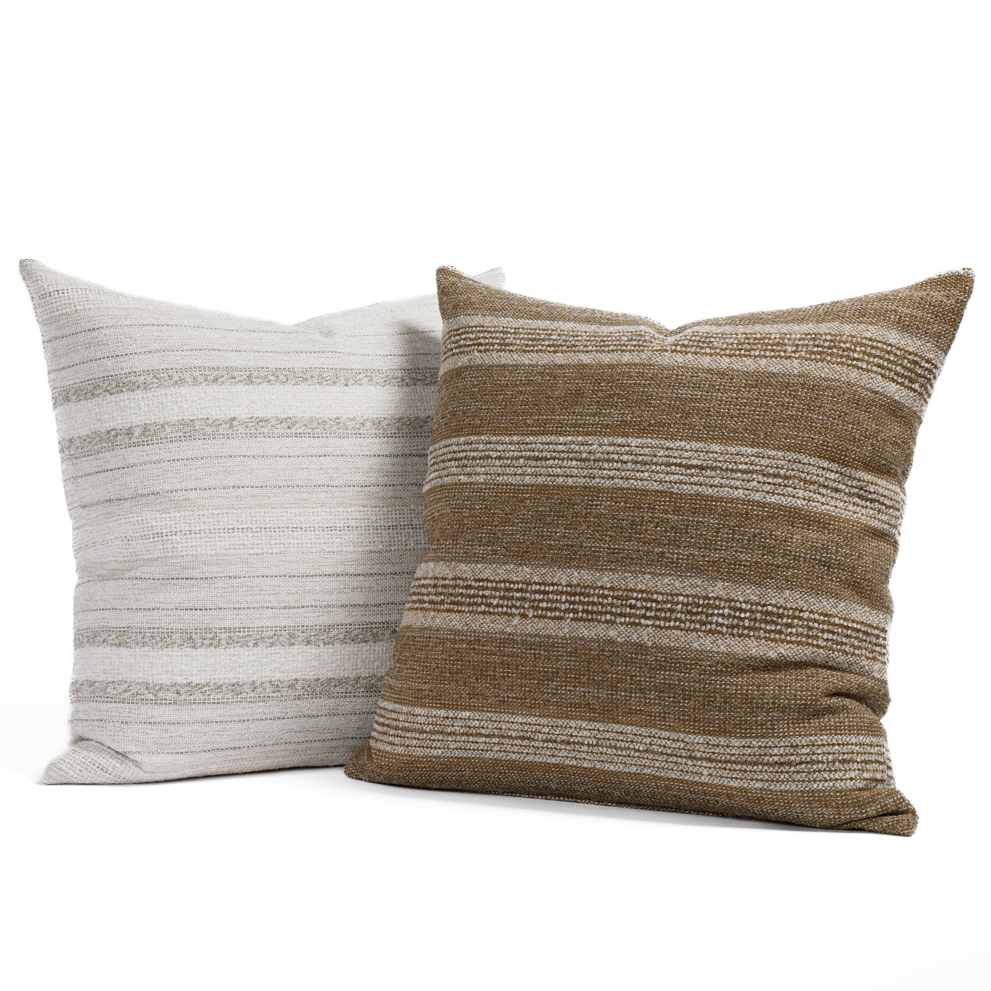 Acadia Salt and Acadia Cinnamon, two 22x22 soft white and light brown textured throw pillows from Tonic Living.