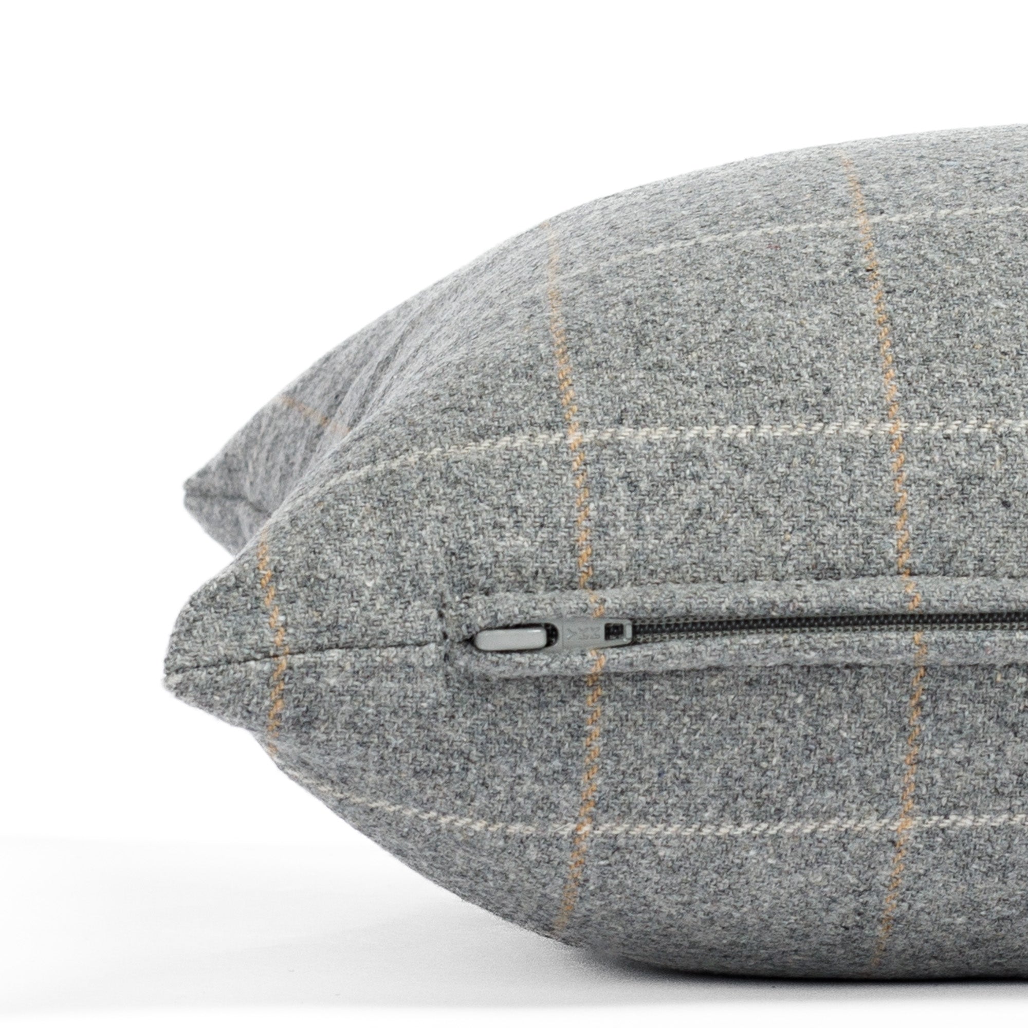 a heather grey windowpane check lumbar pillow: close up zipper view
