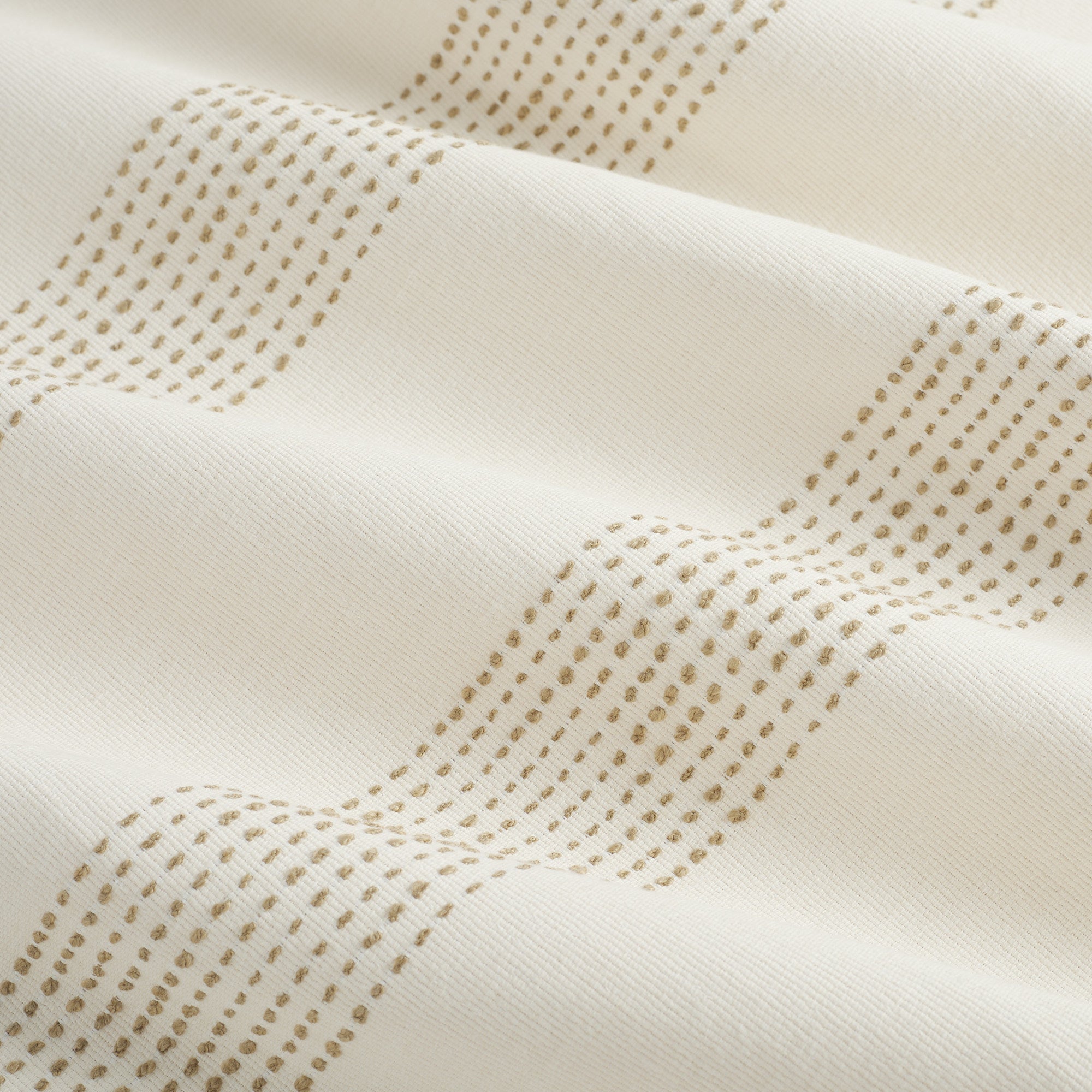 Tonic Living Caper Sunbrella Linen performance fabric featuring embroidered stripe in light brown and white tones.