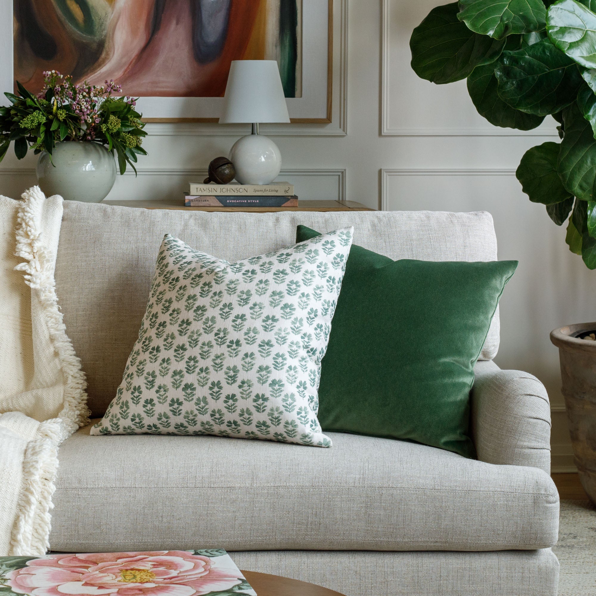 Bright green throw pillows from Tonic Living, styled in a living room.