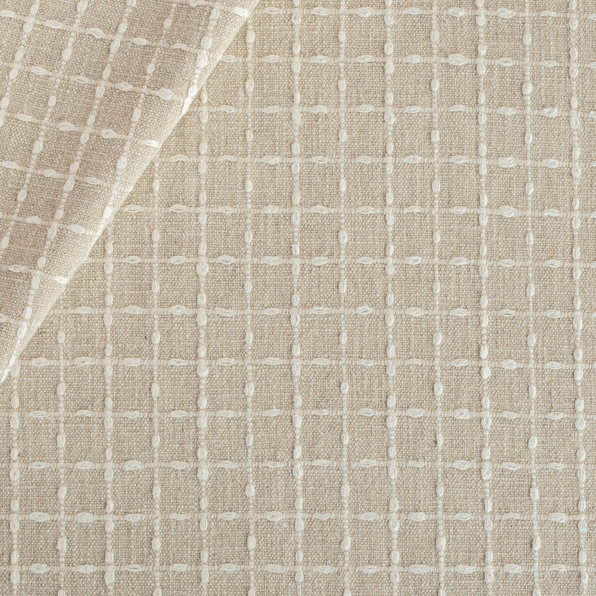 a beige with cream windowpane stitch pattern home decor fabric