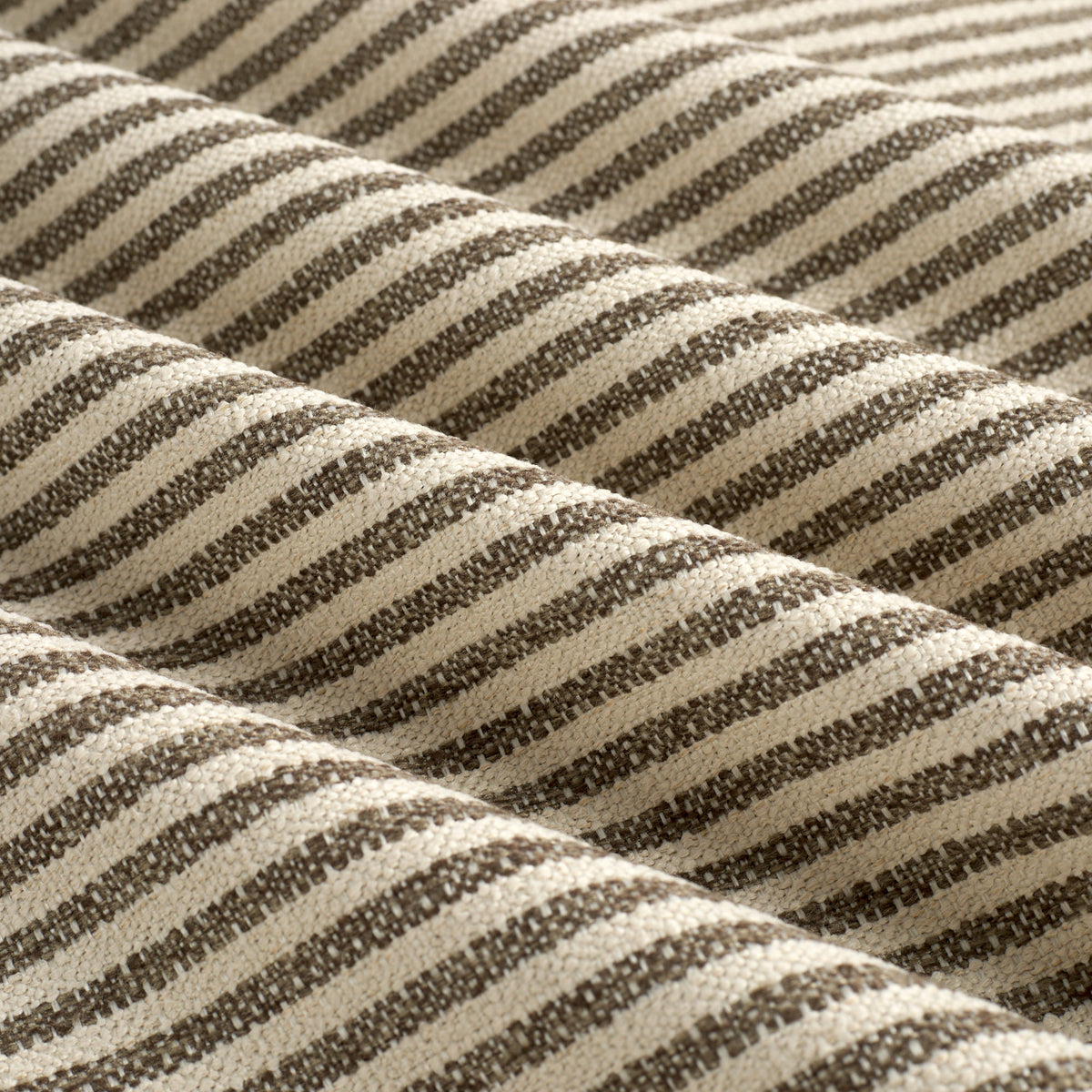 Tonic Living Crosby Stripe Truffle performance upholstery fabric featuring a refined brown and beige striped pattern.