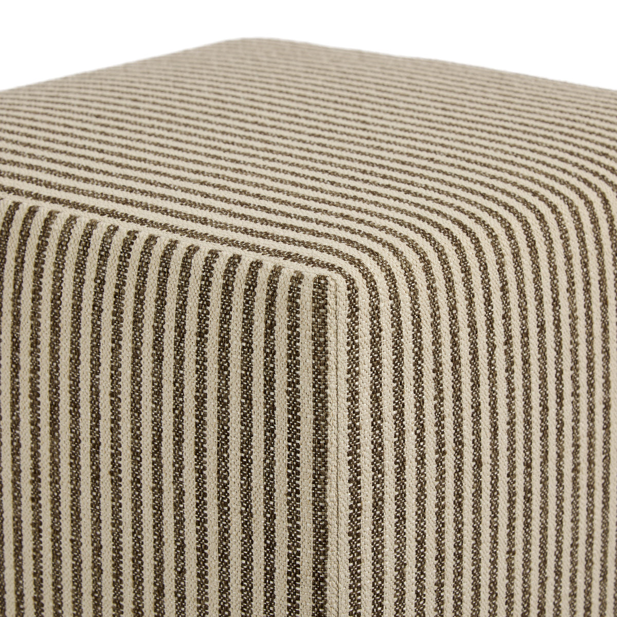 Close up of Tonic Living Crosby Stripe Truffle ottoman showing brown and beige striped upholstery and tailored corner detail.