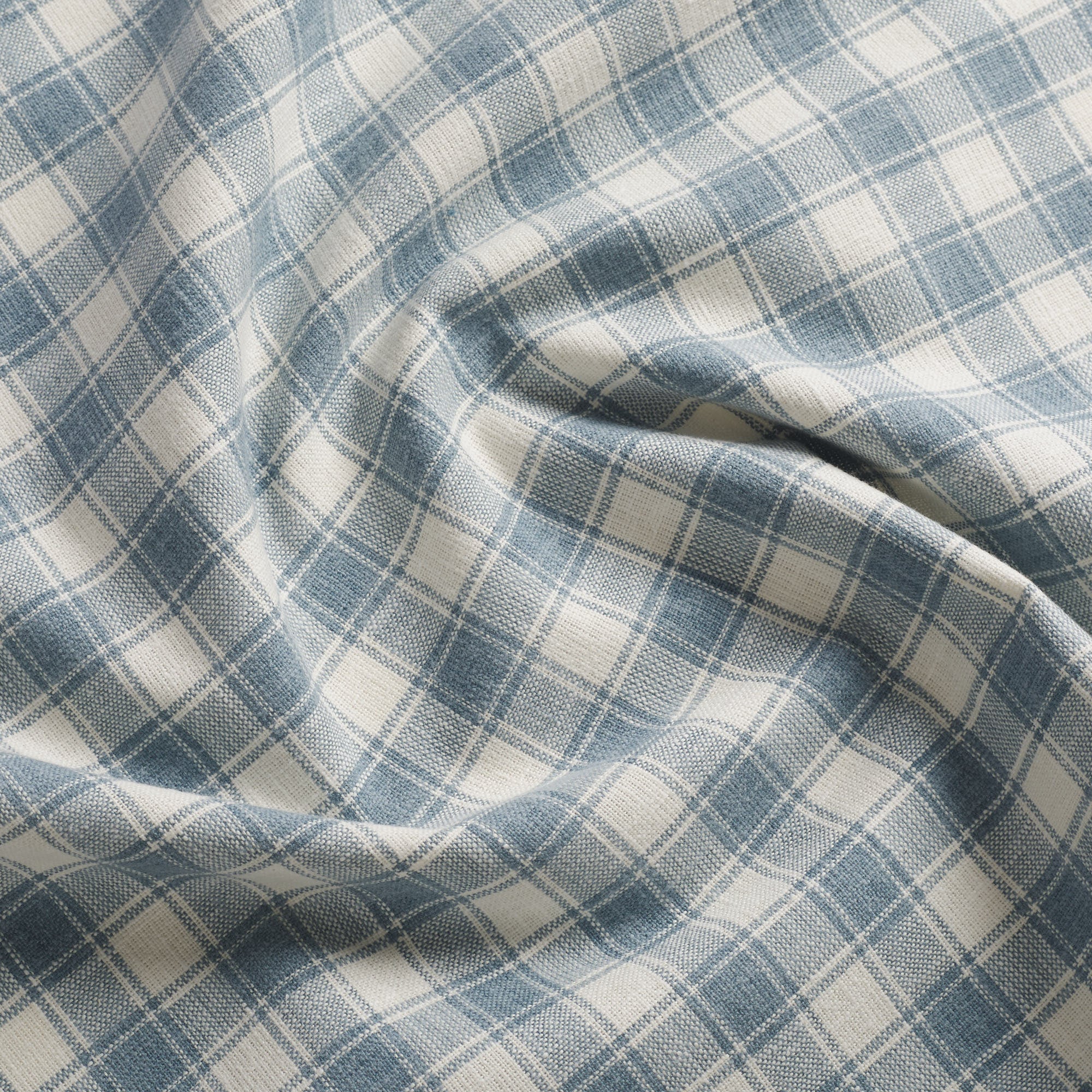 Tonic Living Emmett Plaid Denim Blue upholstery fabric in a versatile blue and ivory plaid.