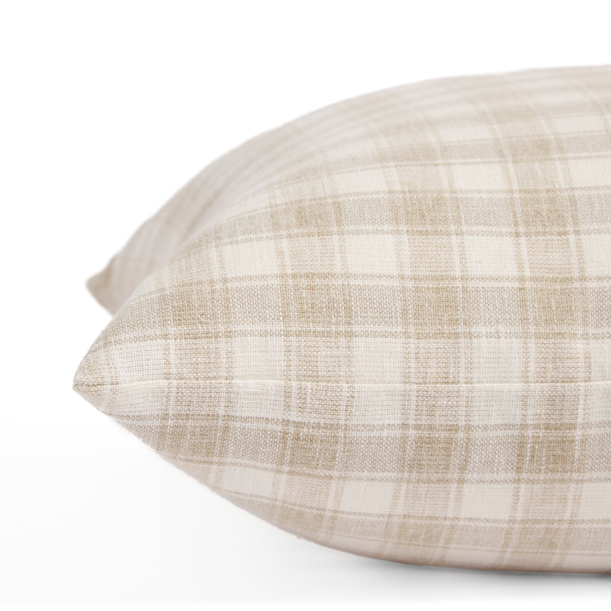 Side view of Tonic Living Emmett Plaid decorative cushion highlighting its timeless neutral check design.