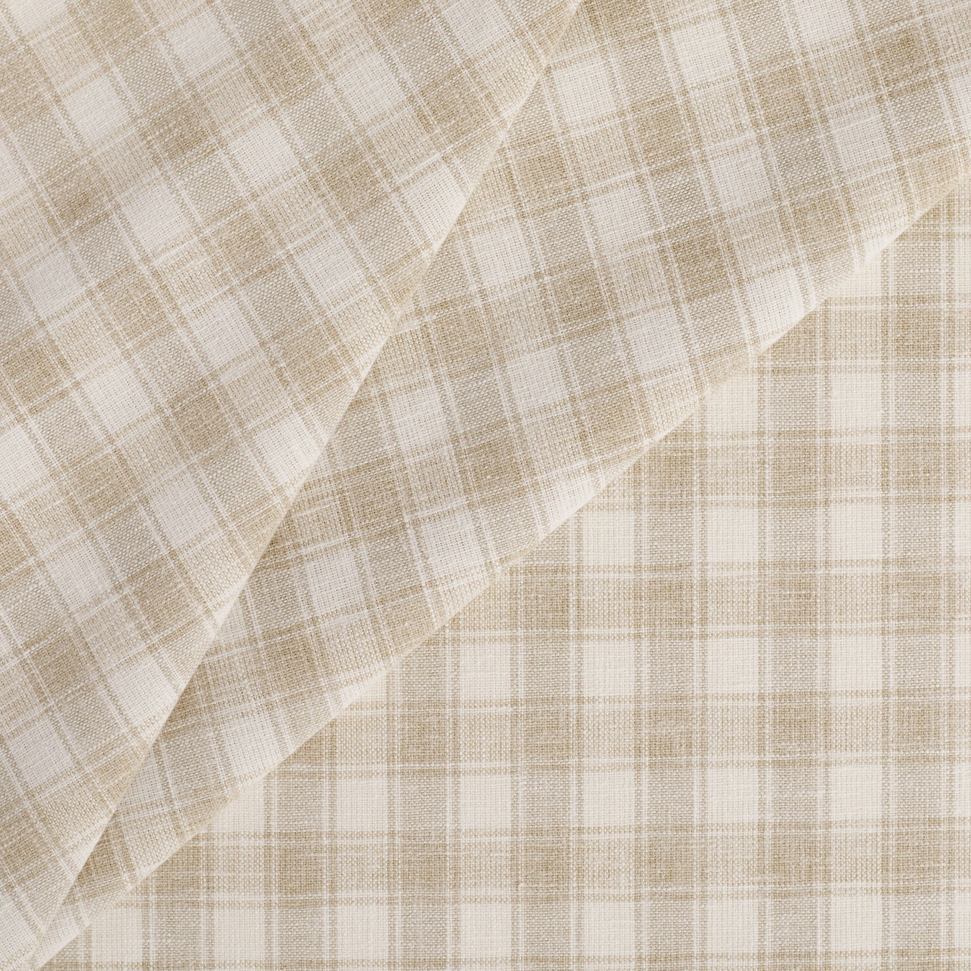 Tonic Living Emmett Plaid Fabric in Flax, a neutral upholstery fabric in soft white and flax beige small-scale check.
