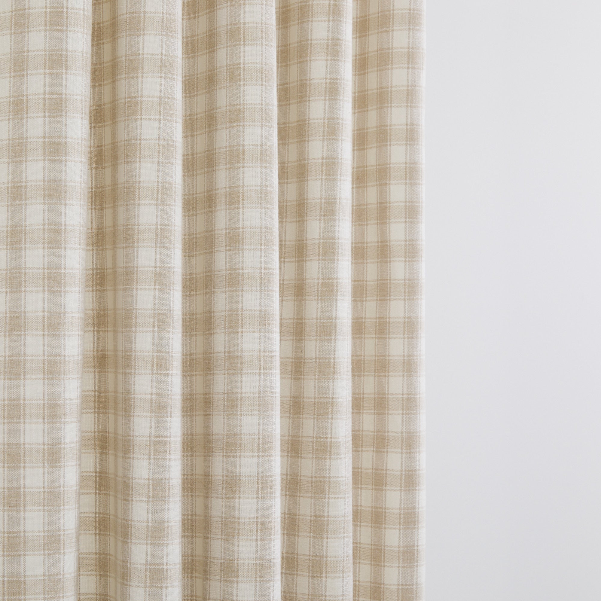 Tonic Living Emmett Plaid Flax fabric ideal for curtains, window treatments and upholstery in a soft beige check.