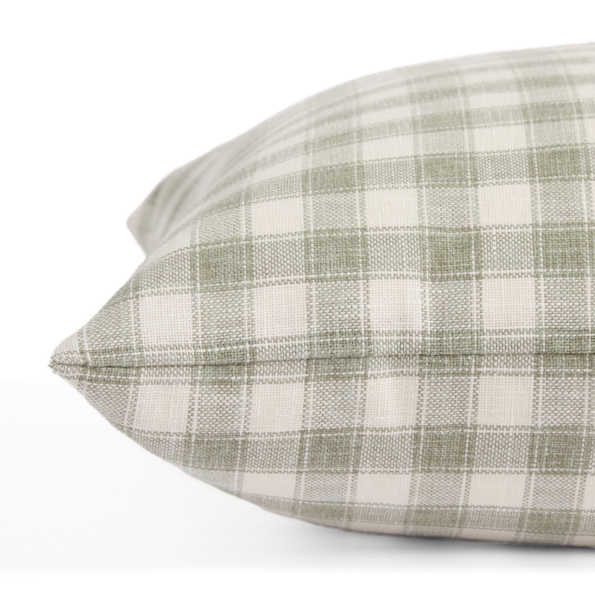 Side view of Tonic Living Emmett Plaid decorative cushion highlighting its classic sage check.