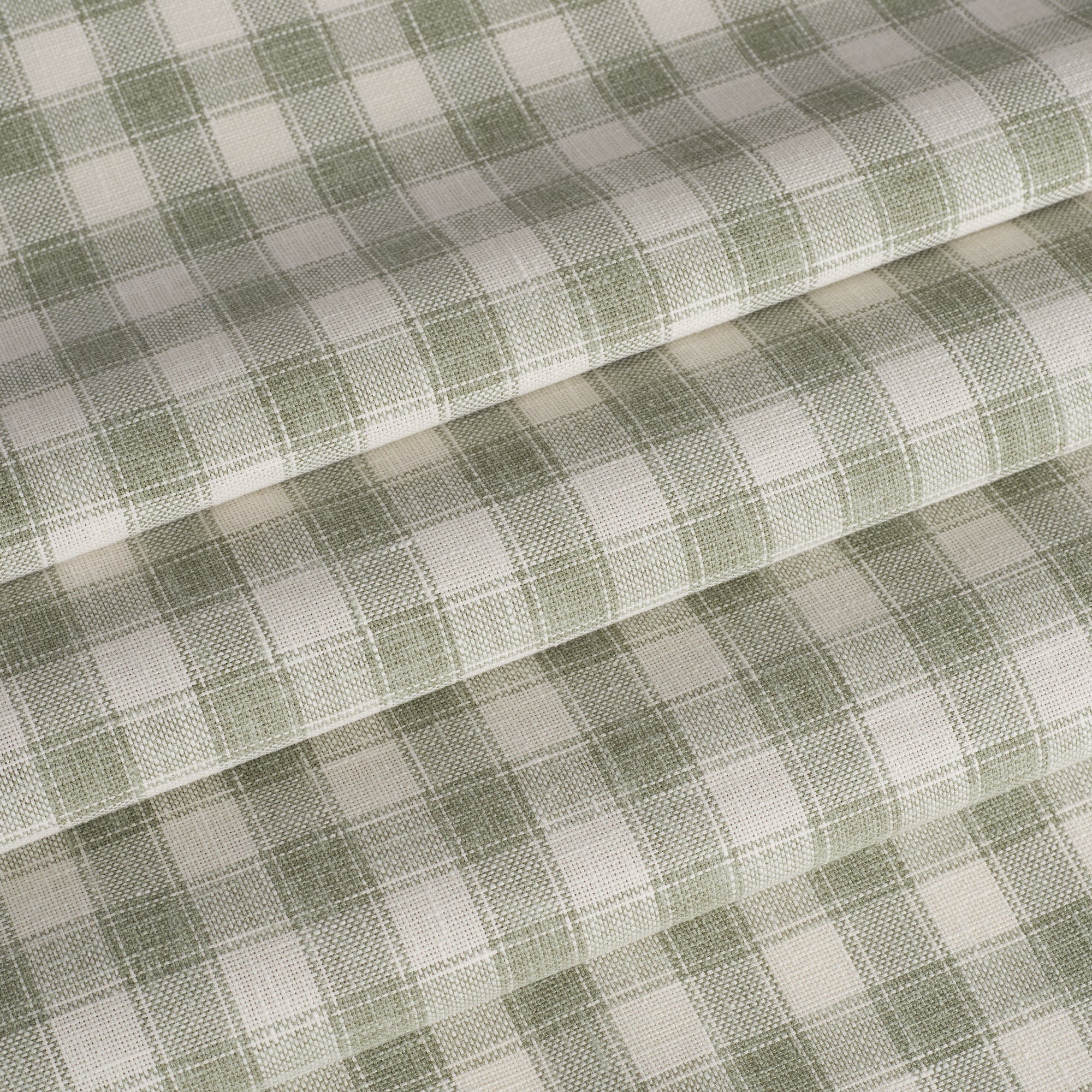 Tonic Living Emmett Plaid Sage home decor fabric ideal for roman shades and curtains in a green check.