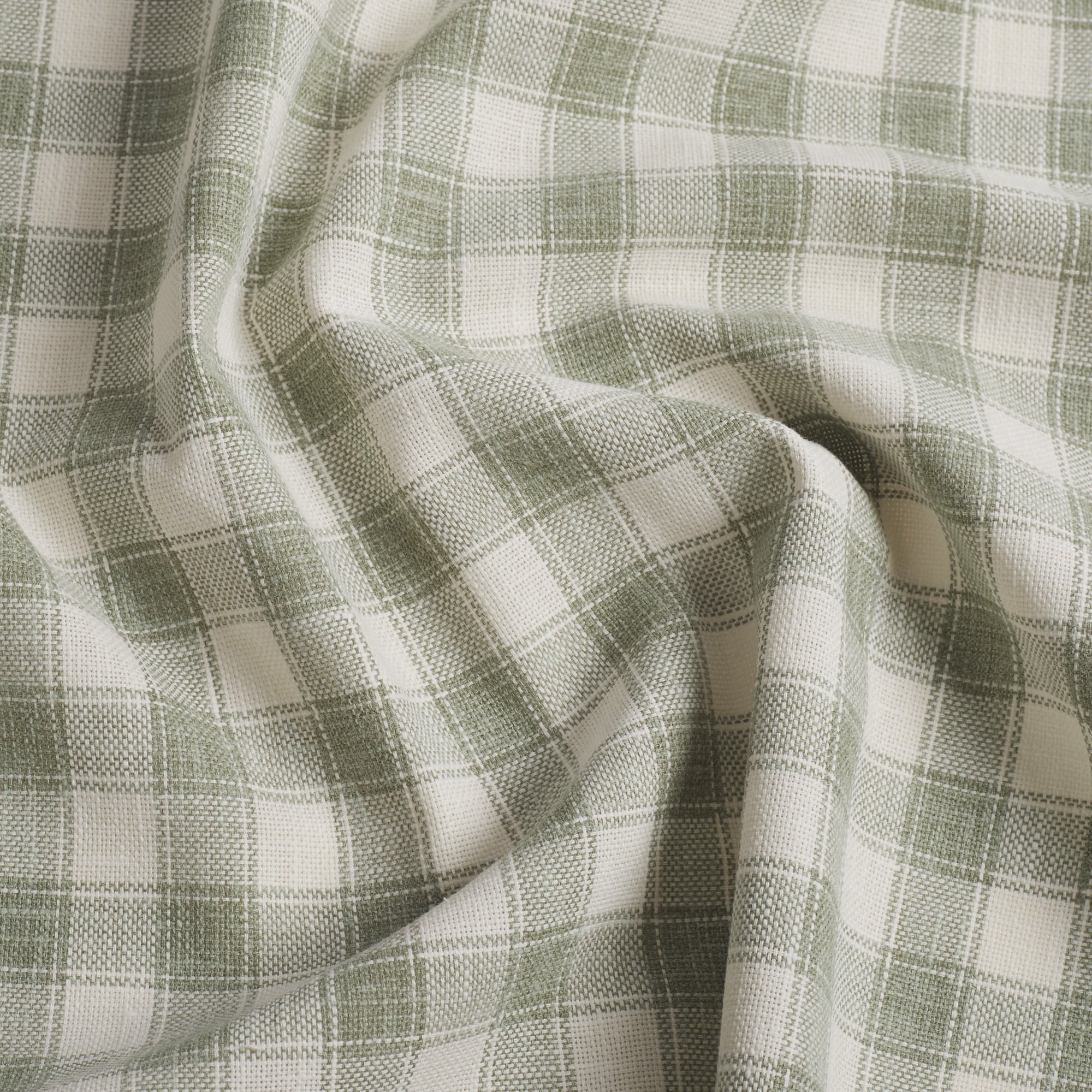 Tonic Living Emmett Plaid Sage upholstery fabric in a versatile light green and white plaid.