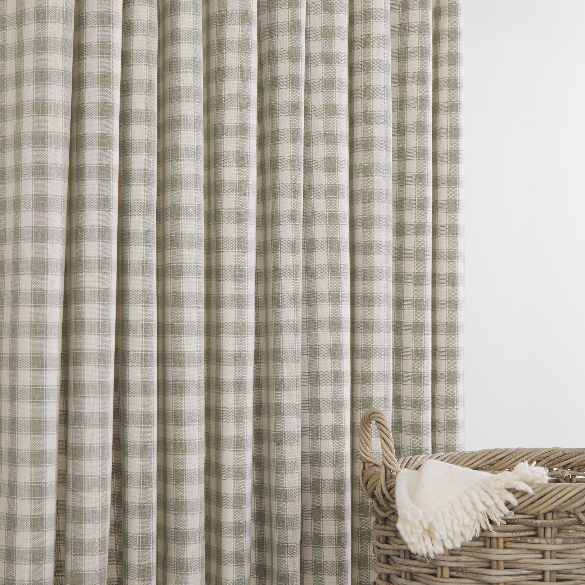 Tonic Living Emmett Plaid Sage drapery fabric in a soft green and ivory small-scale check.