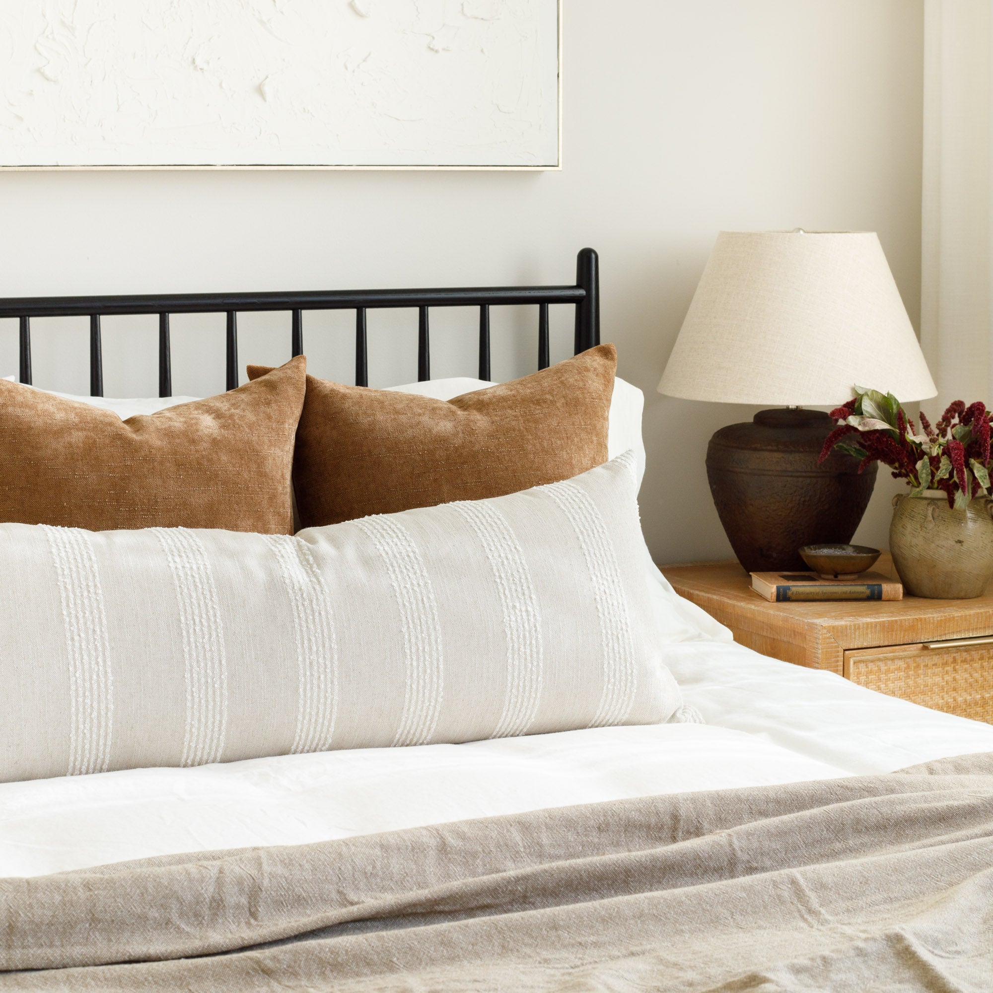 Tonic Living bed pillowscape: Blaine Cinnamon and Finn Stripe Natural Bolster
