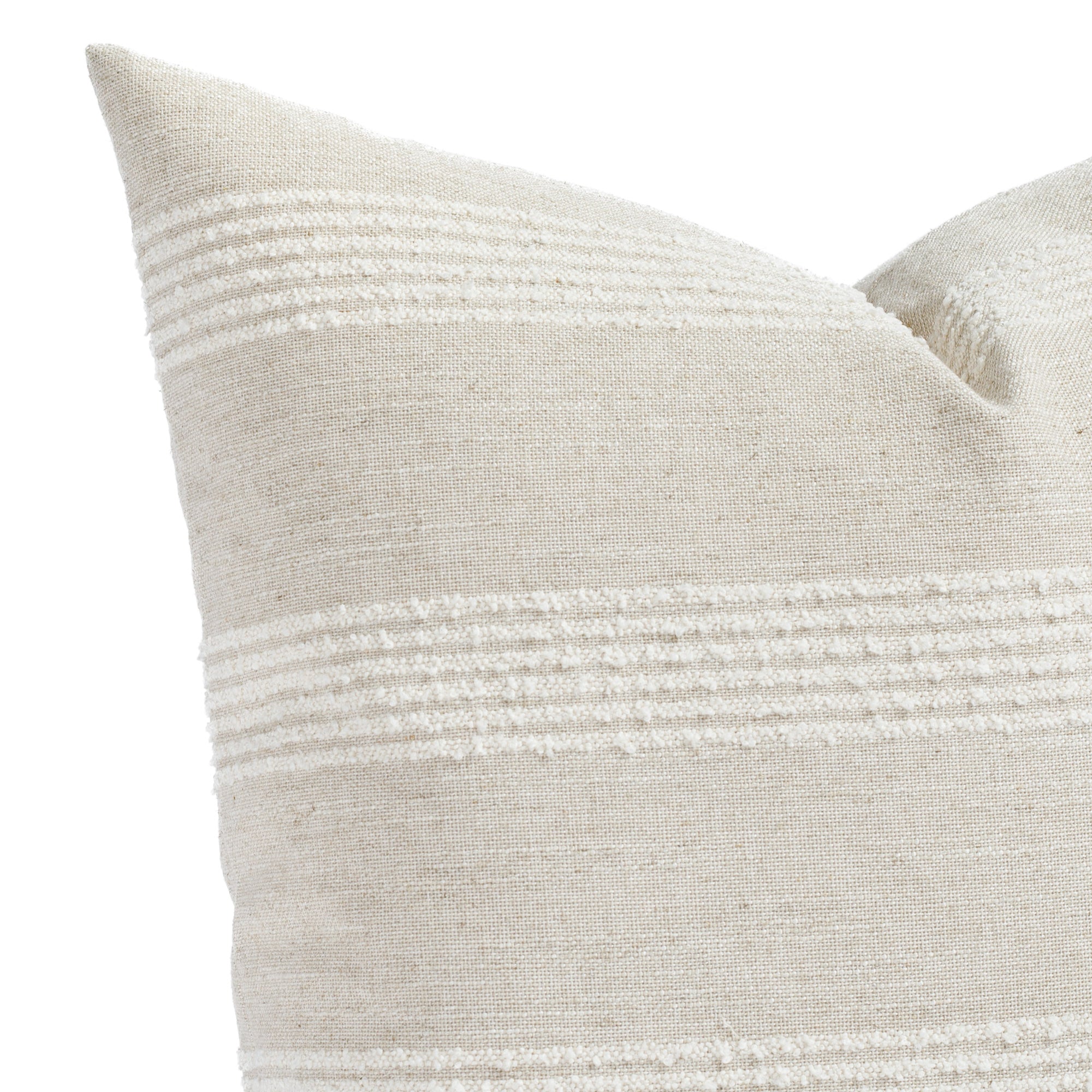 an off white and oatmeal striped pillow : close up view