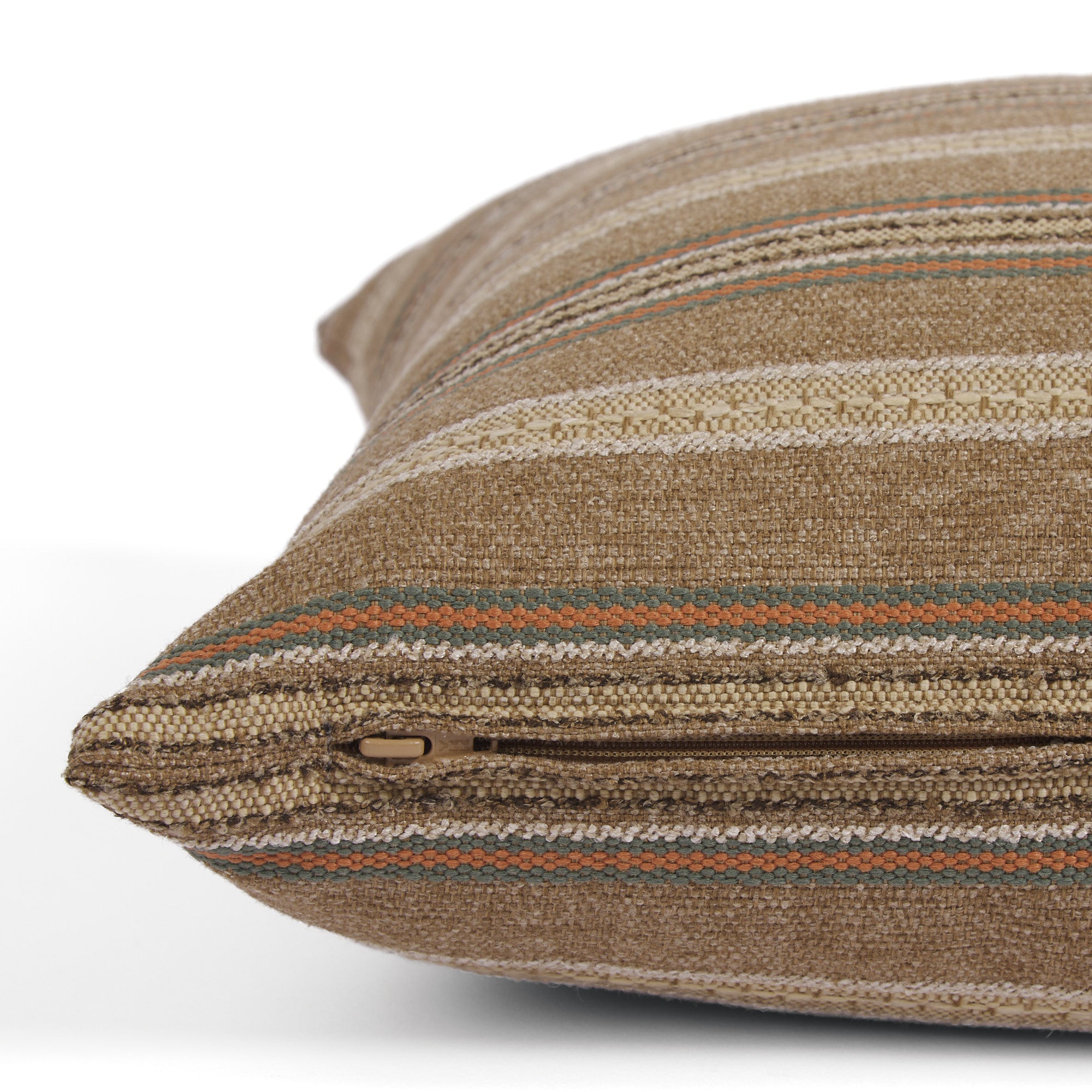 Side zipper detail of Tonic Living Fisher Stripe 20x20 pillow in warm cinnamon brown.