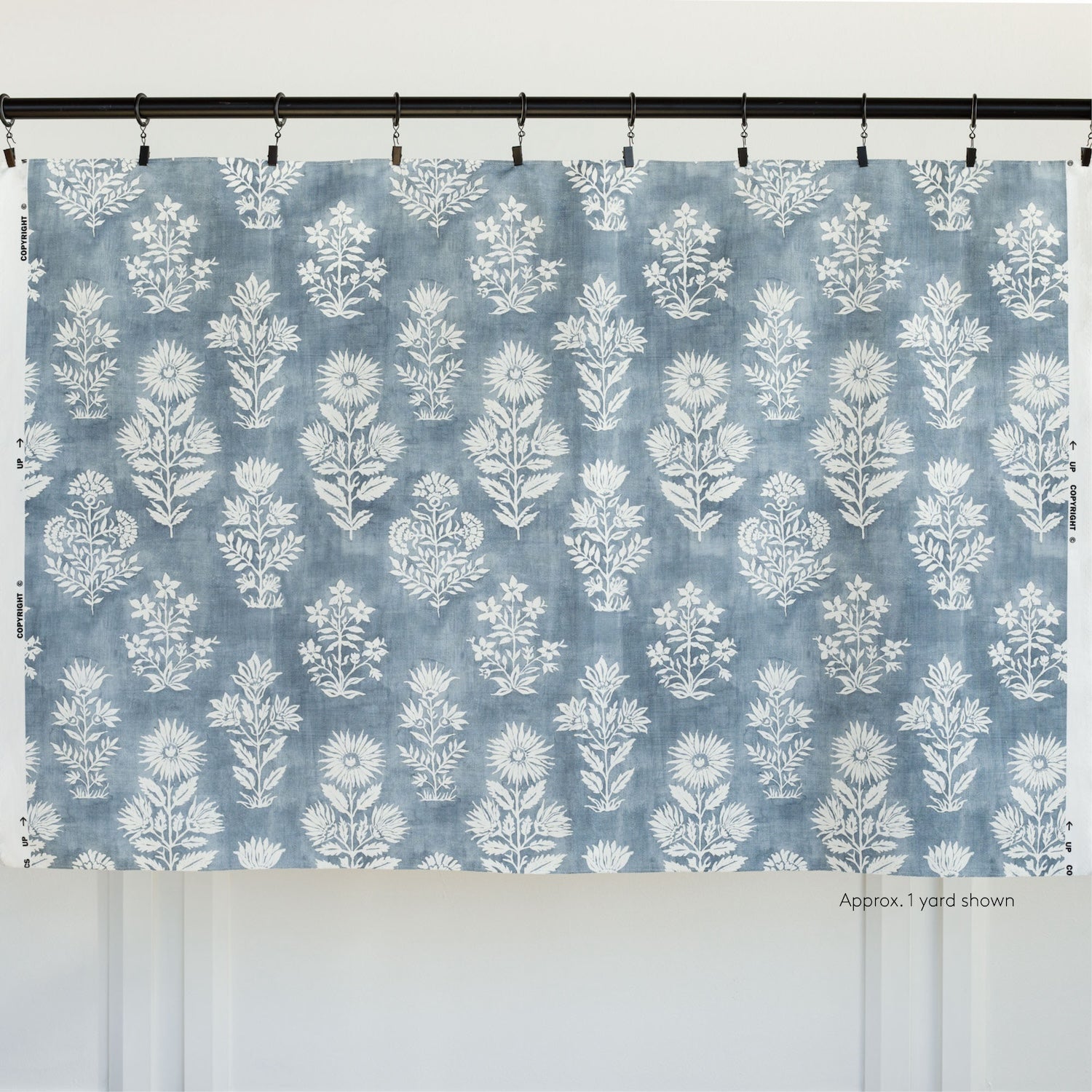 a blue and white batik inspired, large scaled floral print drapery fabric from Tonic Living