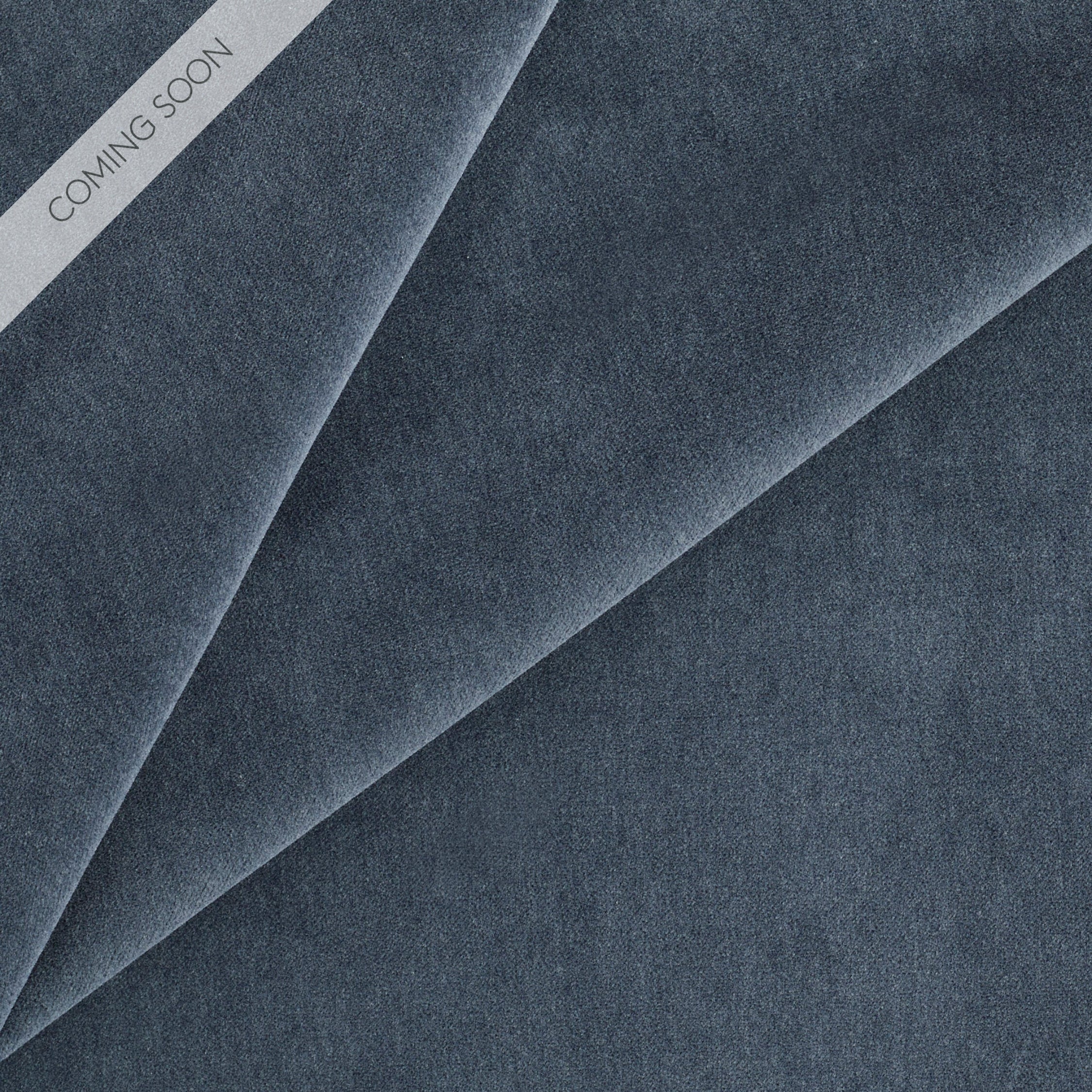 Tonic Living Florence Velvet upholstery fabric in Mineral Blue, a deep blue-grey solid.