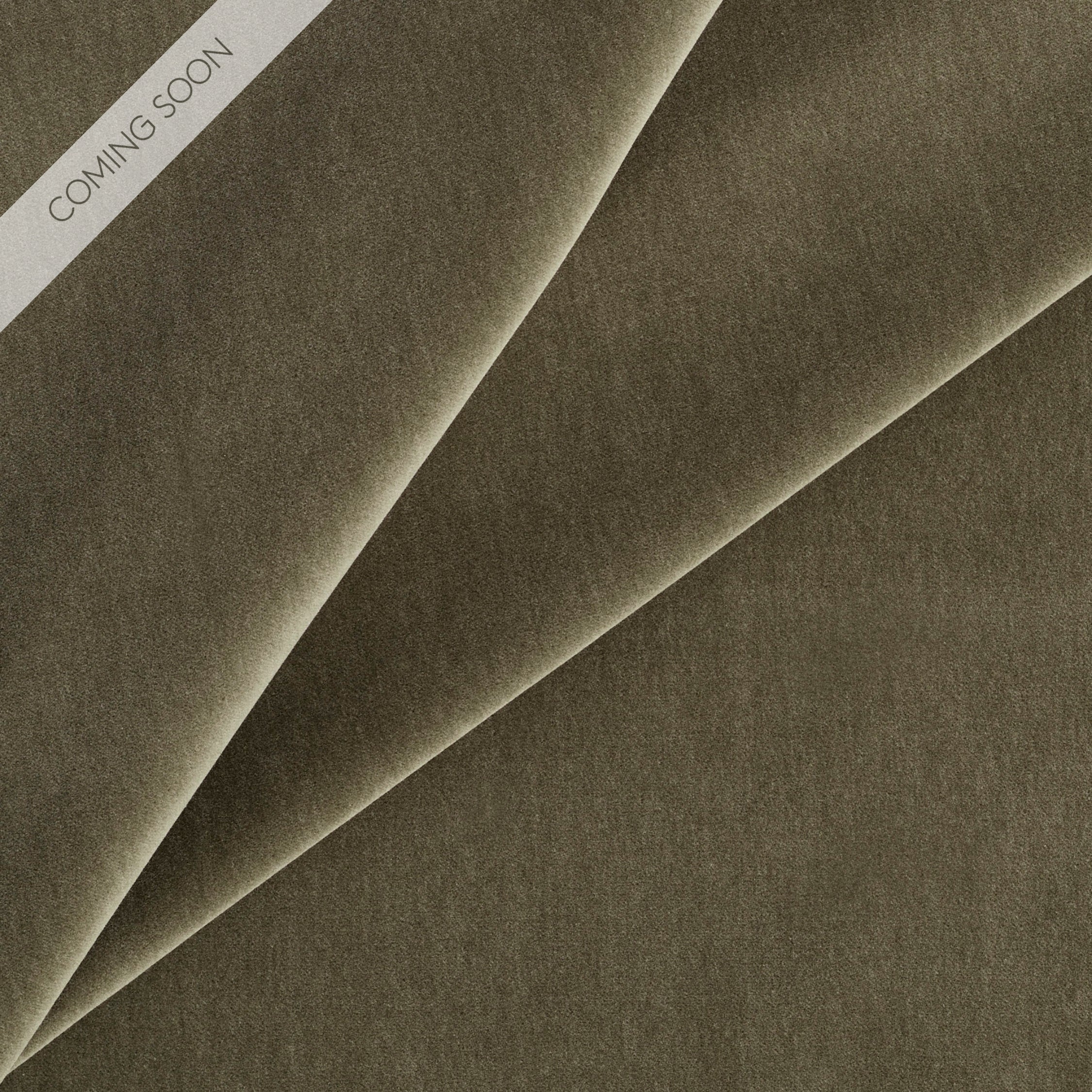 Tonic Living Florence Velvet upholstery fabric in Olive, a rich earthy green velvet.