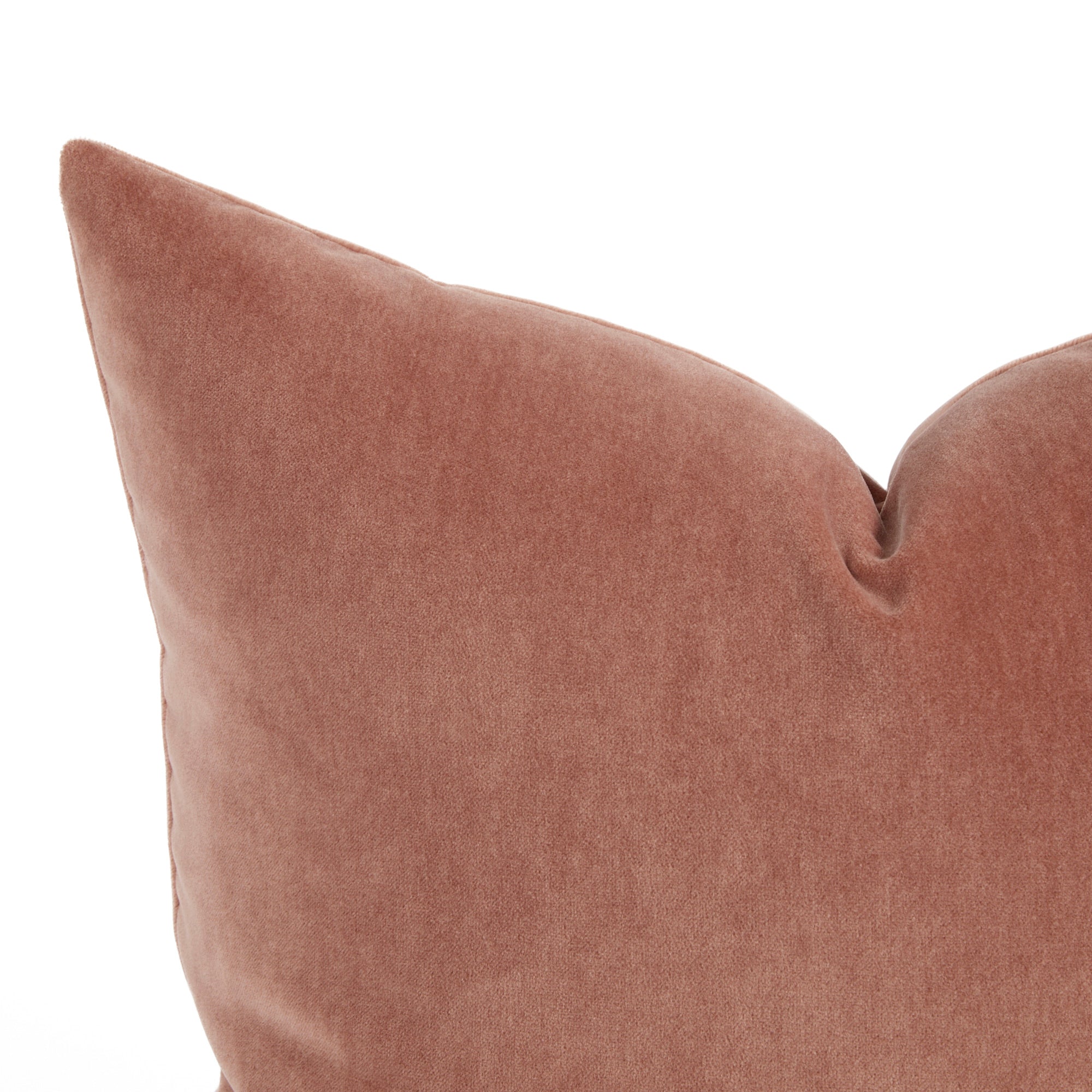 Close up of Tonic Living Florence Velvet pillow in antique pink showing its plush velvet texture.