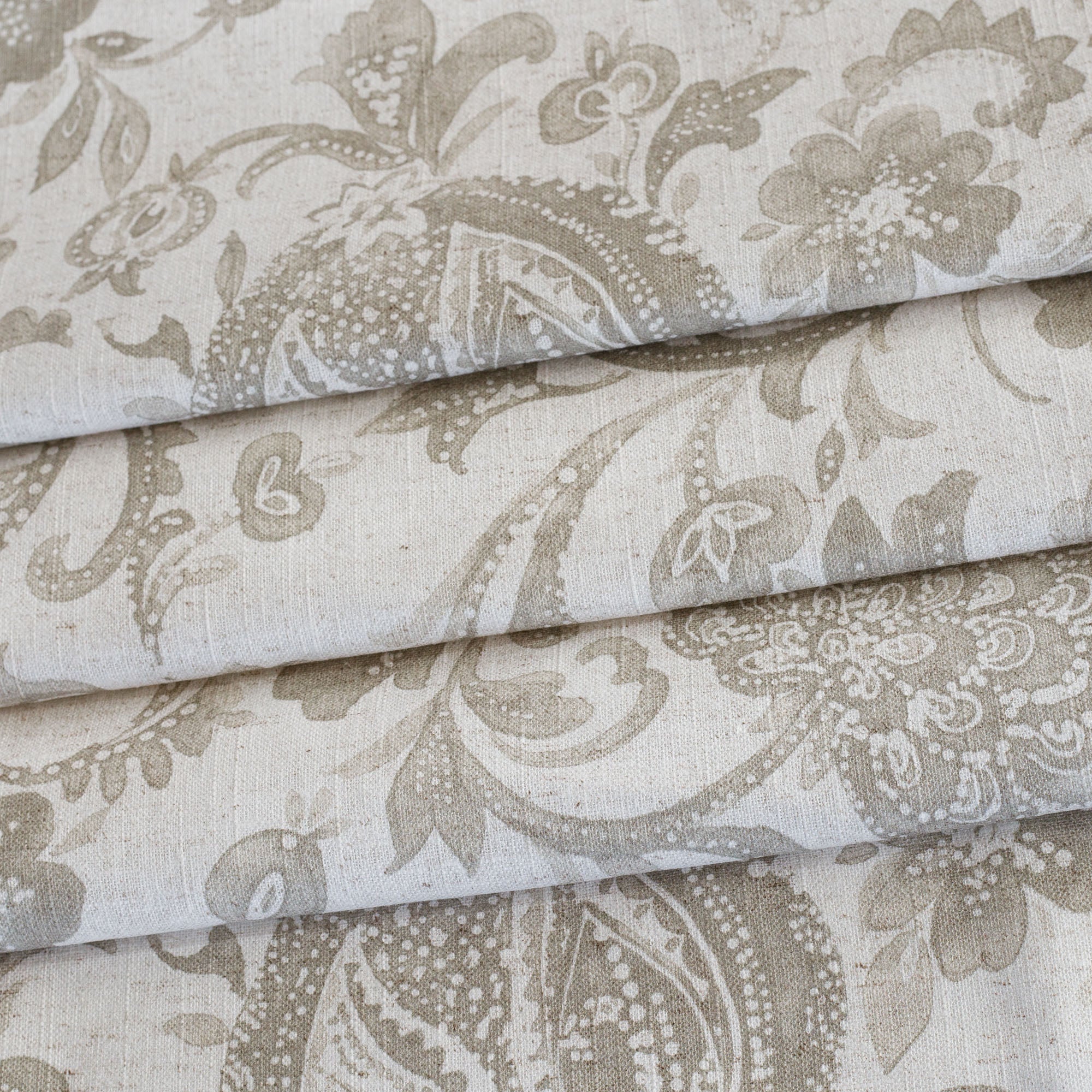 an oatmeal and earthy grey floral print multi purpose fabric from Tonic Living