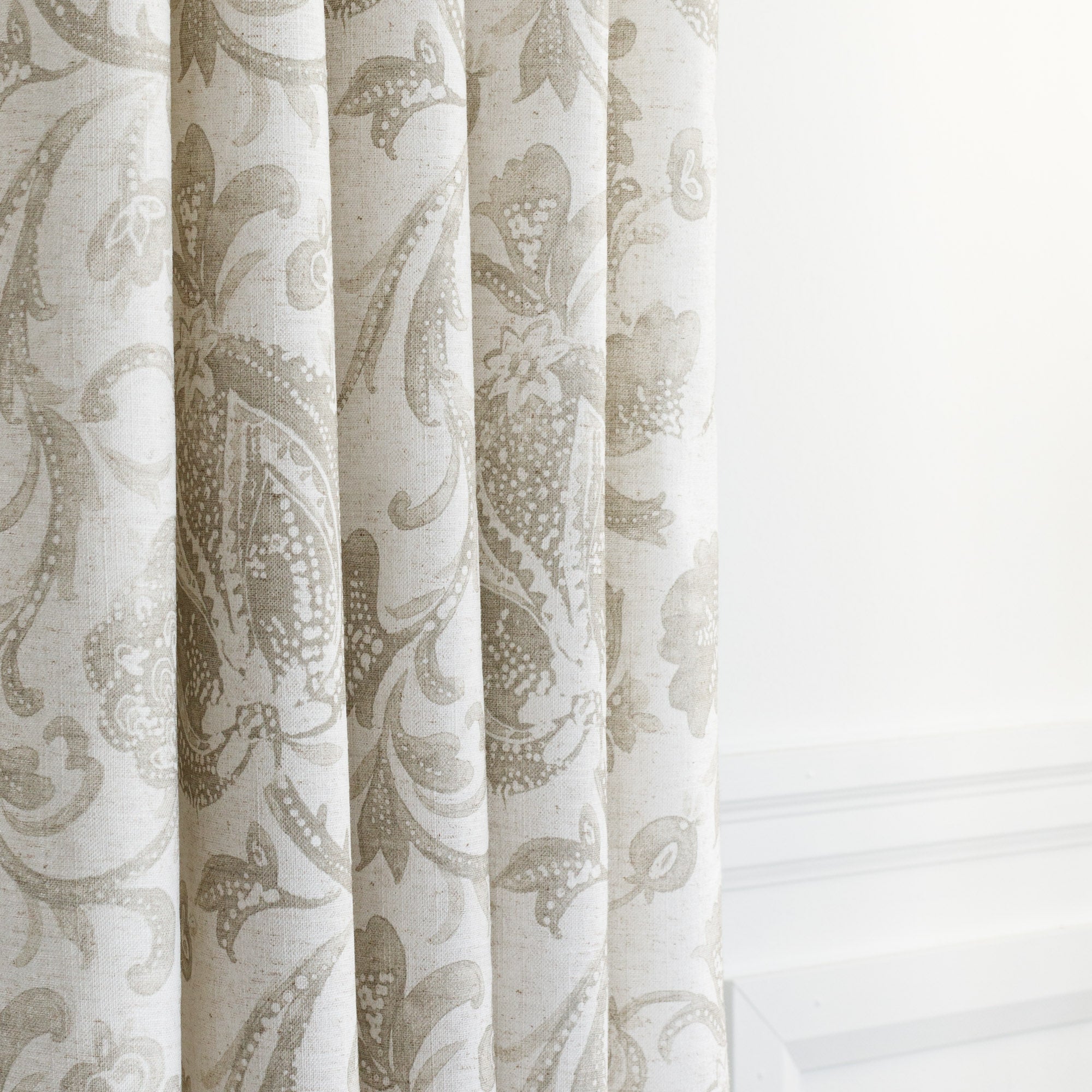 an oatmeal and earthy grey drapery fabric