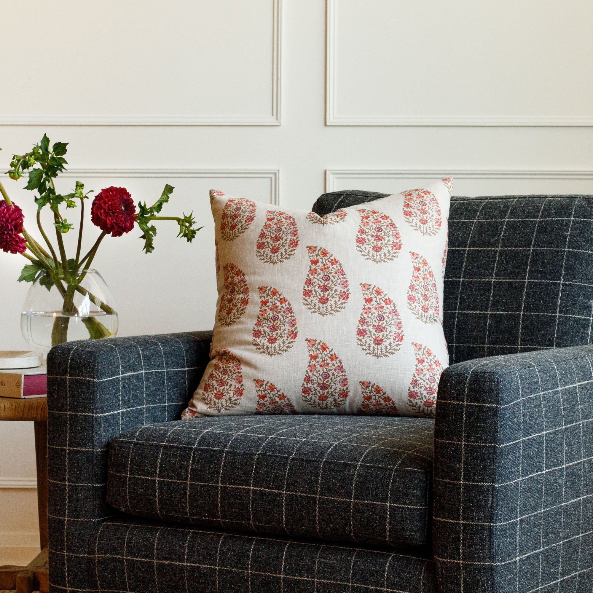 Tonic Living Grace 20x20 Pillow, Rosewood styled on a chair, featuring floral paisley botanical pattern.