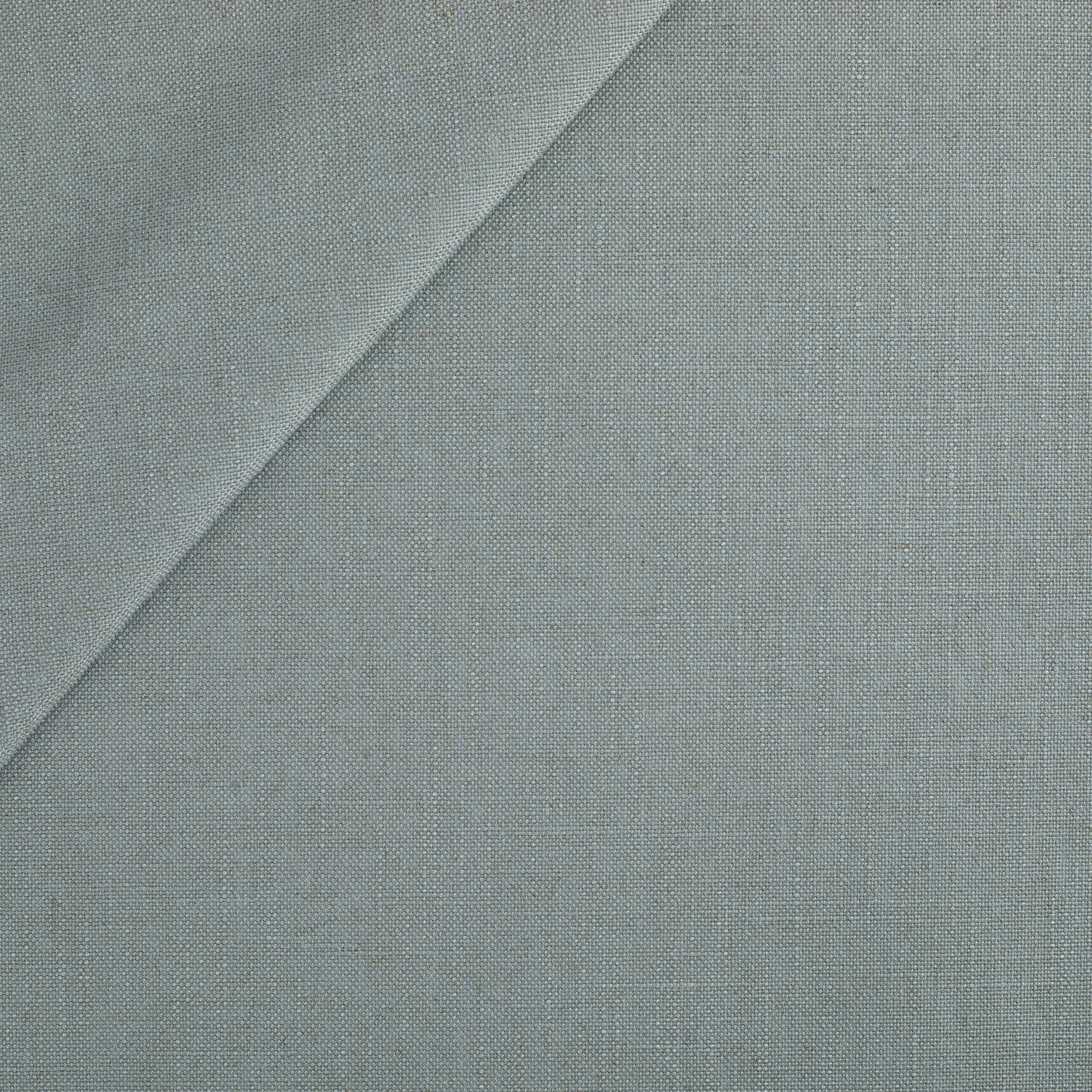 Tonic Living Hampton Fabric in Chambray, a dusty blue high-performance upholstery fabric with a Belgian linen look.