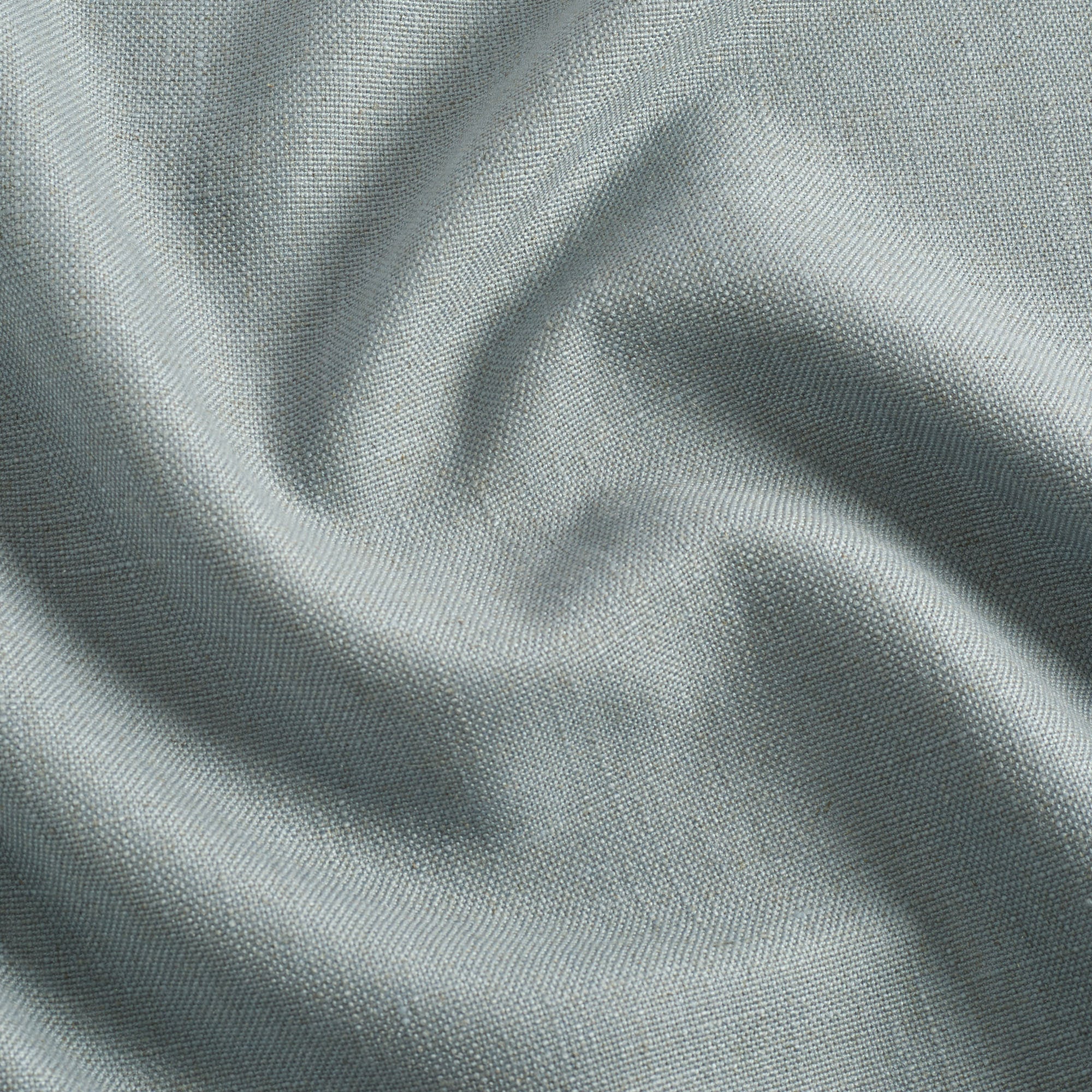Tonic Living Hampton Chambray performance fabric with a soft dusty blue woven texture inspired by Belgian linen.