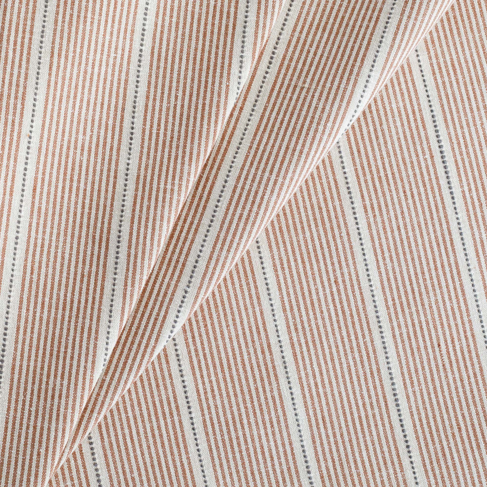 a rust red, parchment and black stripe multi use fabric