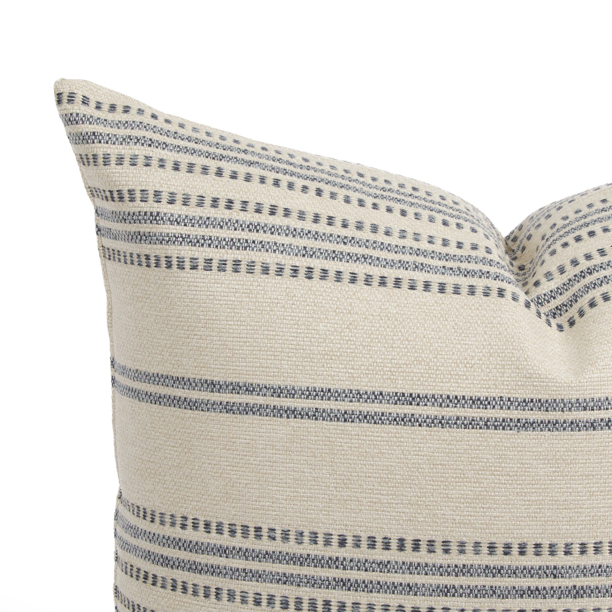 Close up of Tonic Living Hopper Stripe cushion showing denim blue and light tan stripe detail with dotted stitch accents.