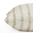 a chestnut brown and cream leaf vine  block print pillow : close up zipper view