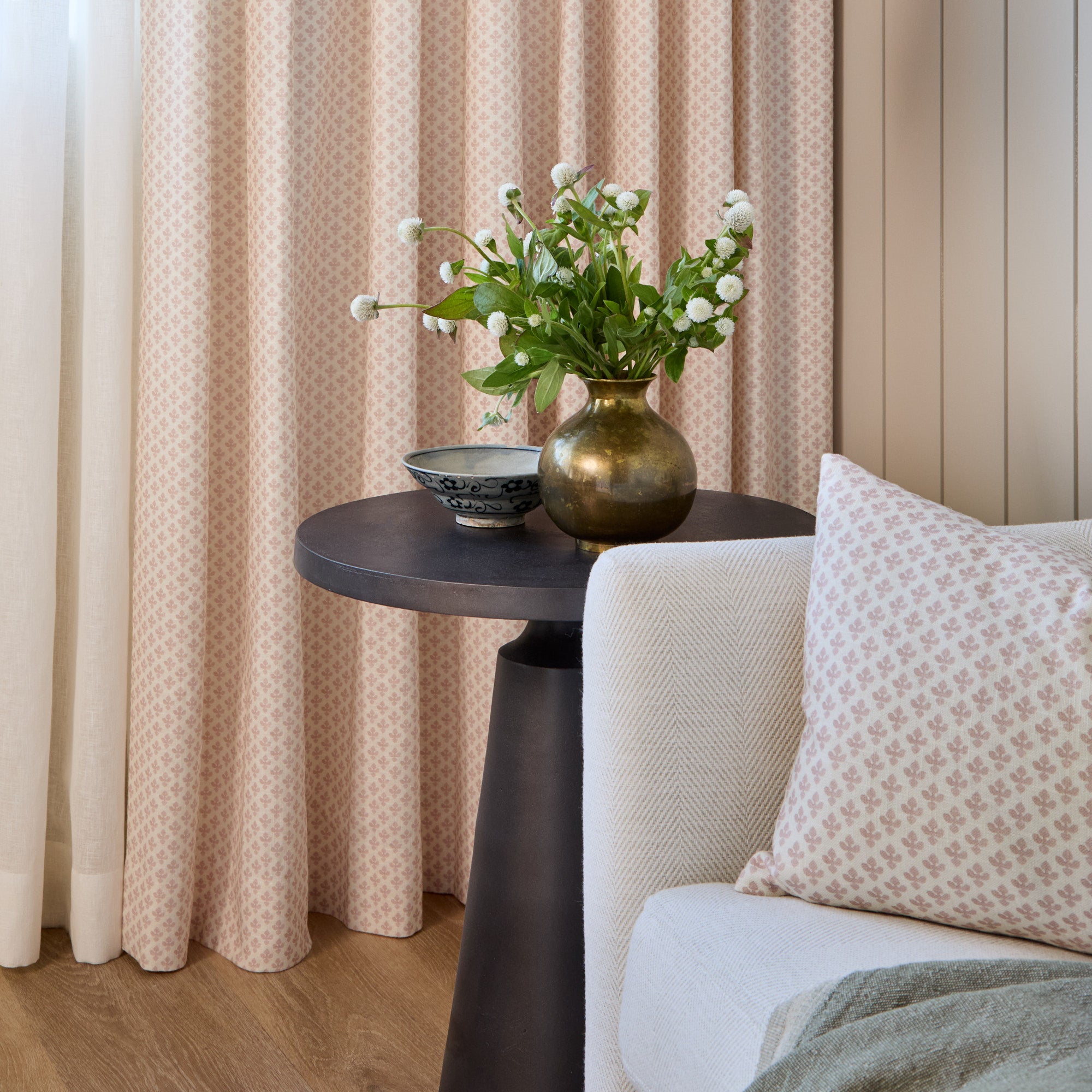 Lyra 14x20 Lumbar Pillow, Blush pink by Tonic Living styled on a chair with matching Lyra Blush floral block print drapery.