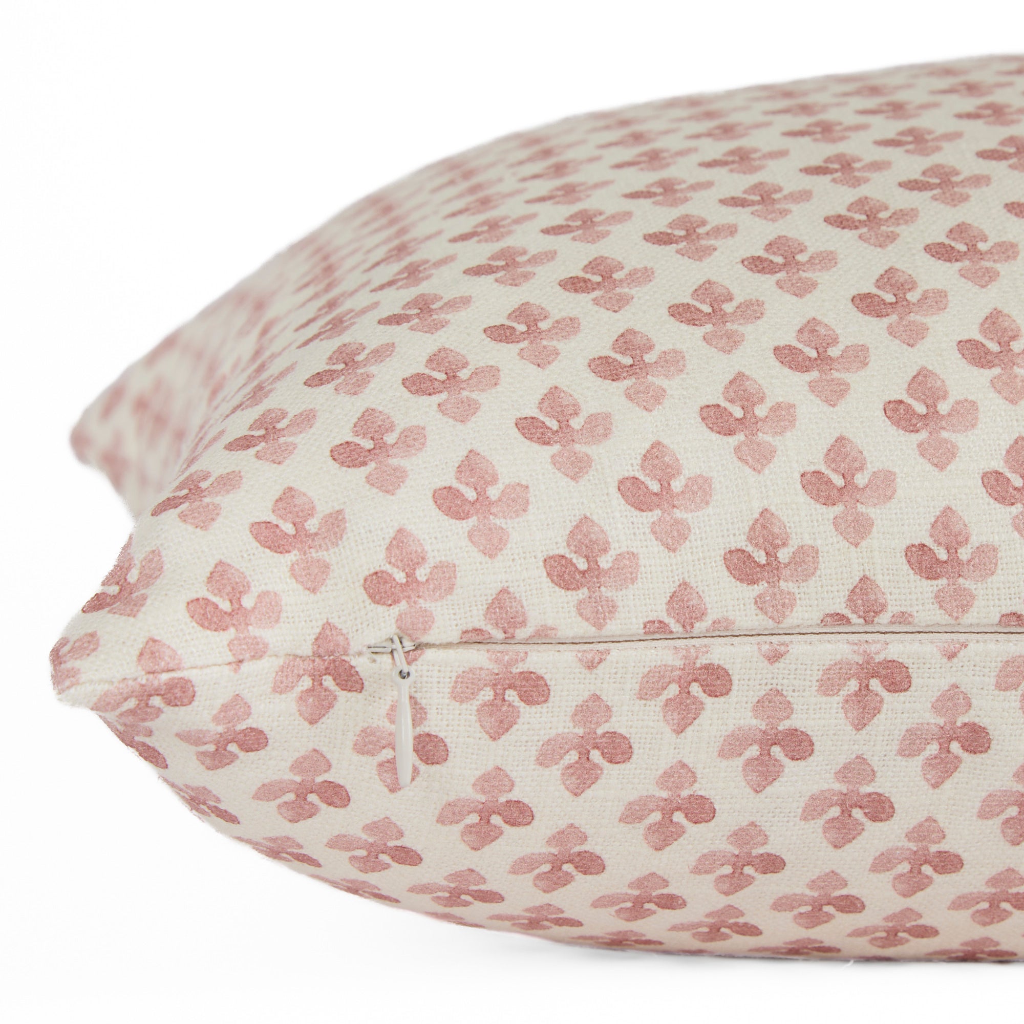 Side zipper detail of Lyra 14x20 Berry lumbar pillow by Tonic Living — linen-blend pillow with a white and faded burgundy floral block print.