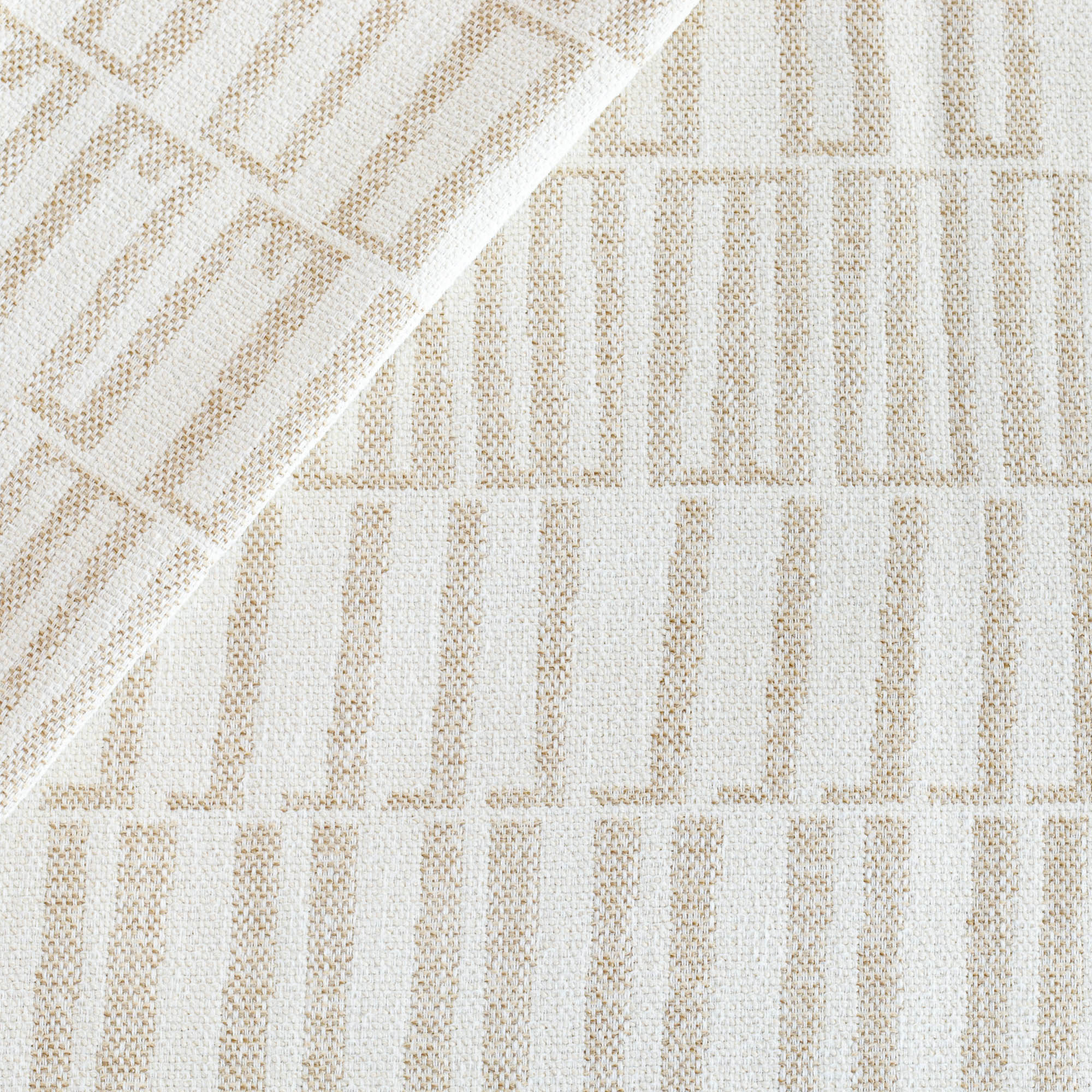 Mallia InsideOut Fabric Toasted Coconut, a beige and white abstract geometric patterned upholstery fabric from Tonic Living