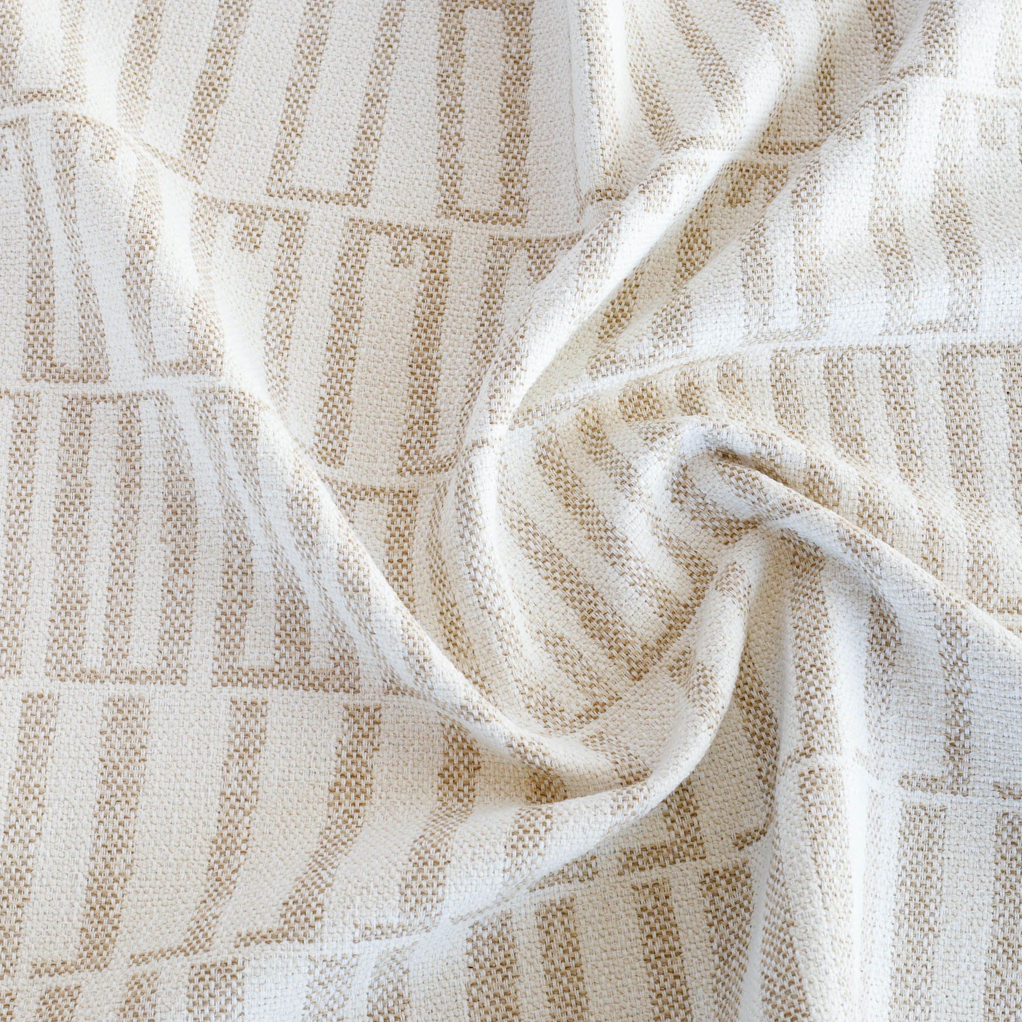 a beige and white abstract geometric patterned outdoor upholstery fabric