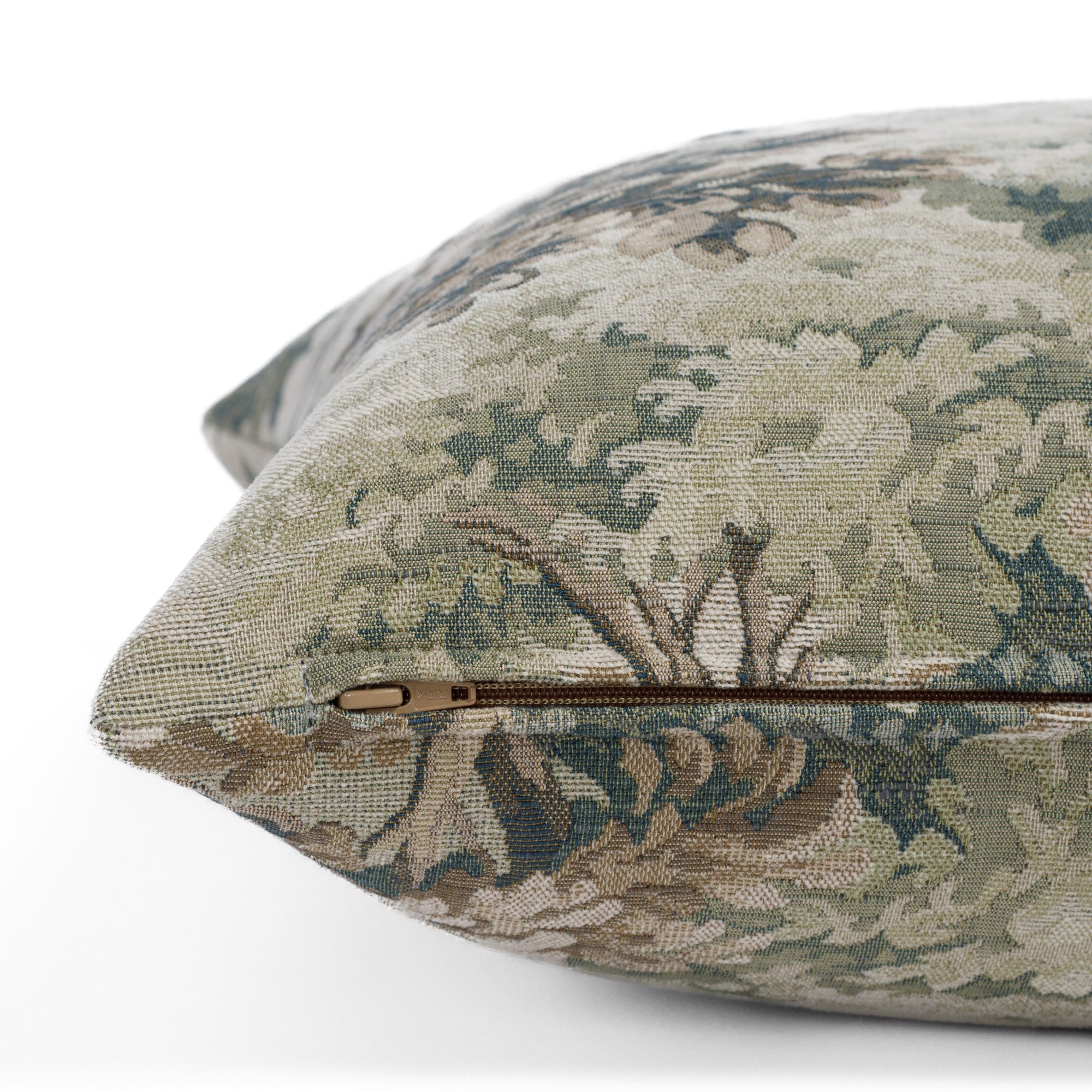 Zipper detail of Manor Tapestry 20x20 toss pillow in sage green tapestry fabric by Tonic Living.