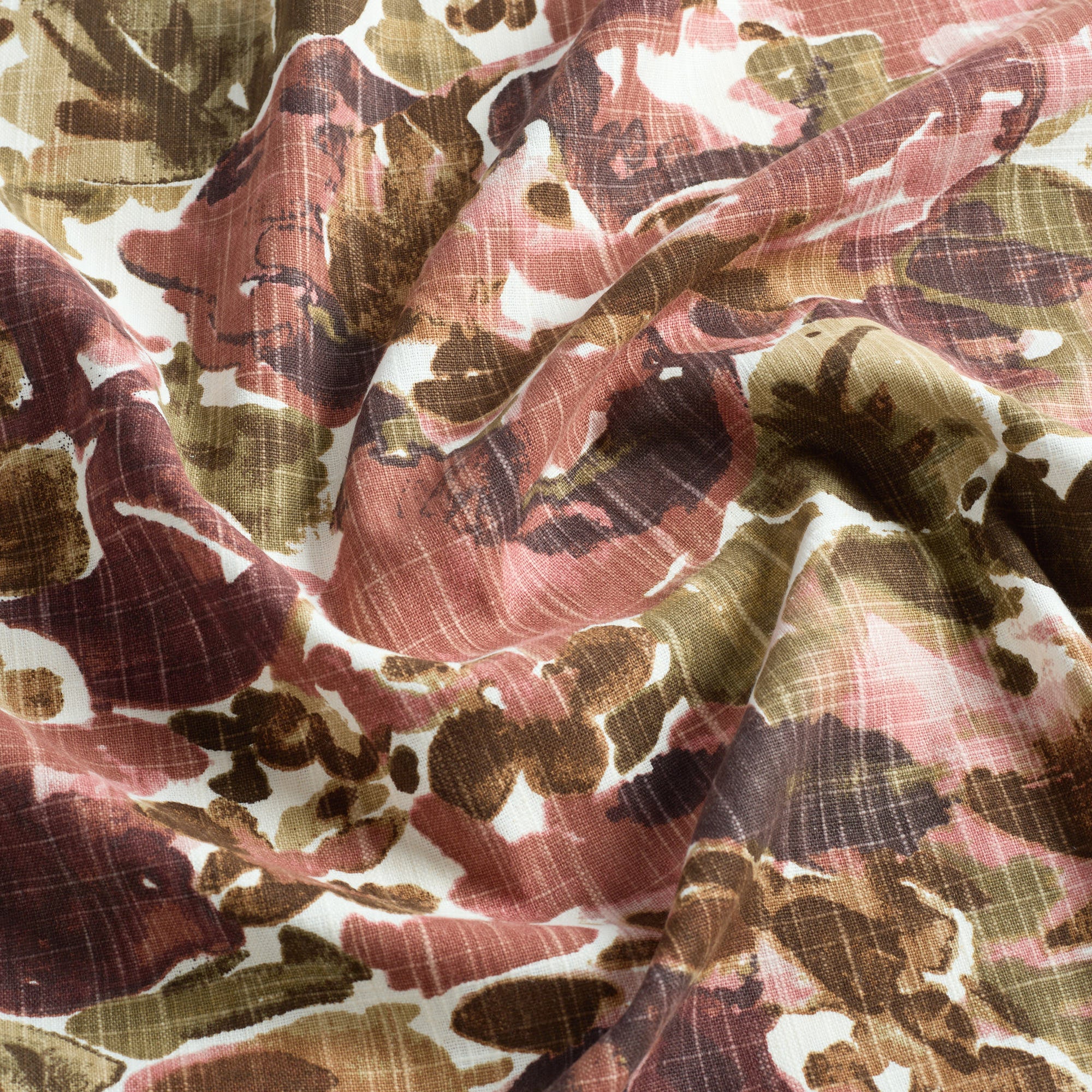Tonic Living Marbella Rose multi-use floral fabric featuring large-scale blooms in warm burgundy and dusty rose.