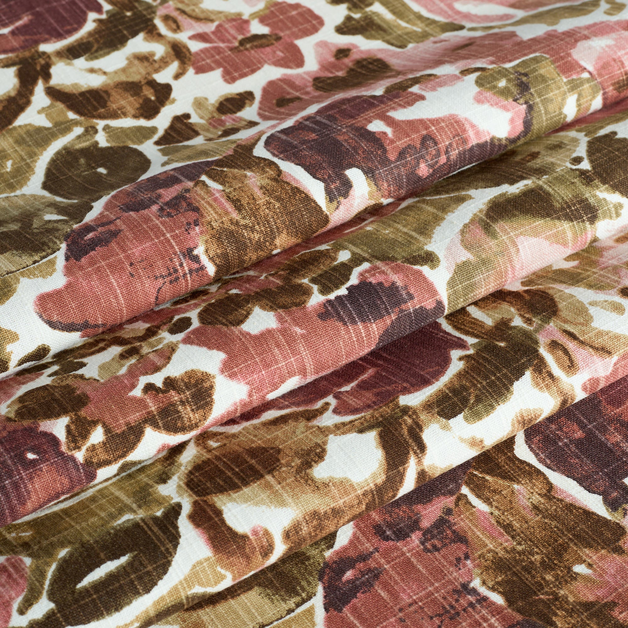 Tonic Living Marbella Rose floral fabric shown as Roman shades with an earthy jewel-toned botanical pattern.