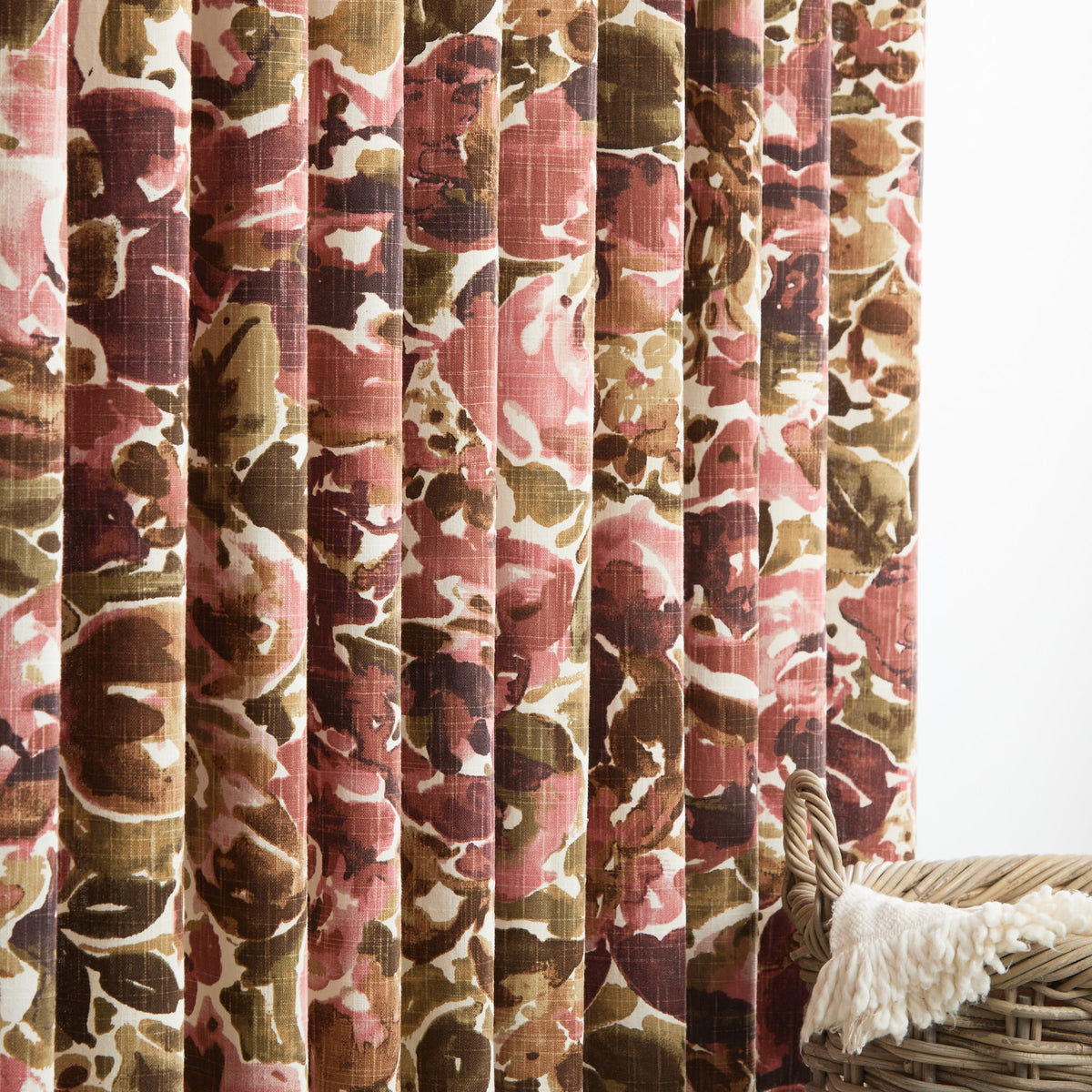 Tonic Living Marbella Rose floral drapery fabric shown as curtains with burgundy and dusty rose tones.