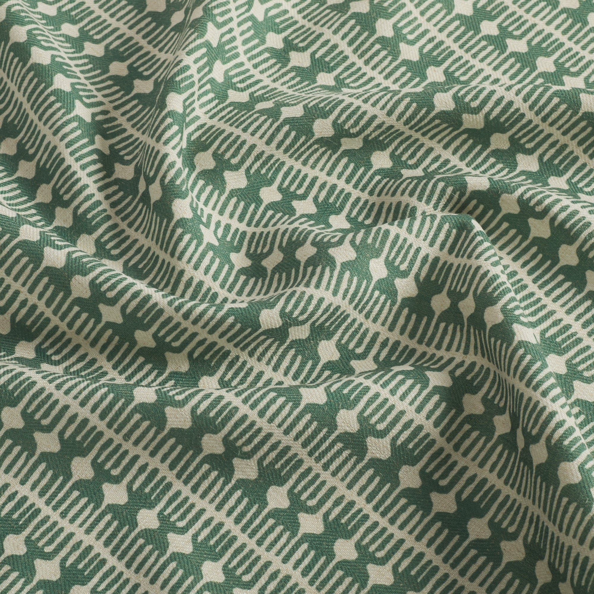 Tonic Living Meadow Emerald home decor fabric with an organic modern block print in green and white.