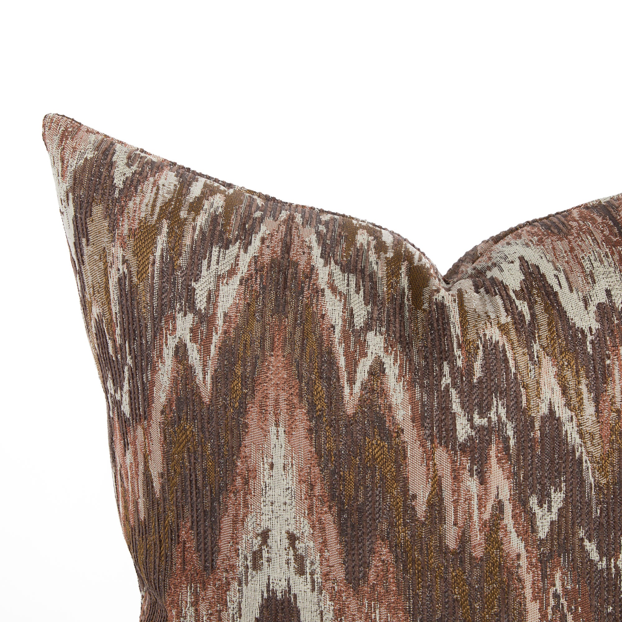 Close up of Tonic Living Mendoza cushion showing its warm multicolour flamestitch pattern.