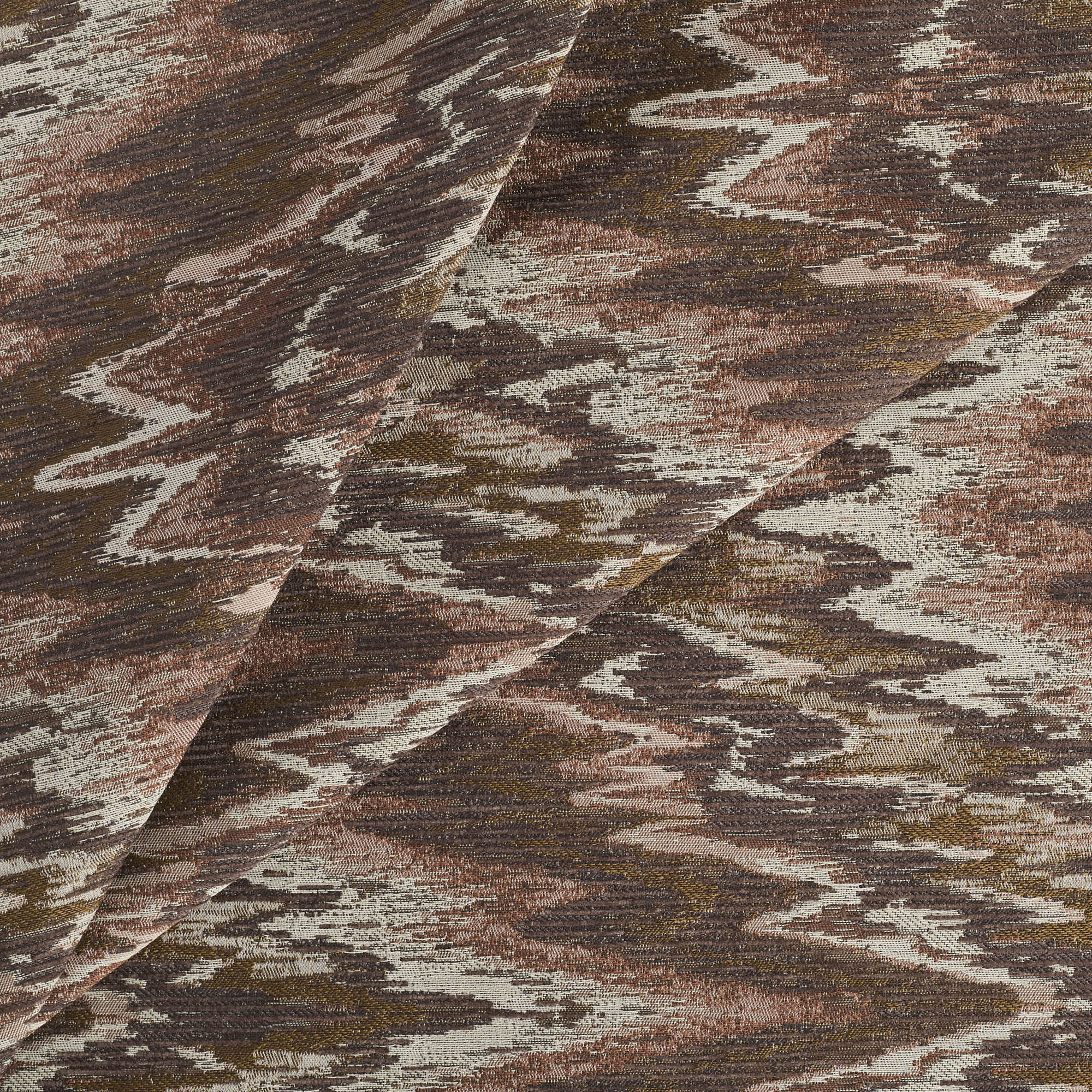 Tonic Living Mendoza Fig home decor fabric featuring an abstract pattern in plum, brown, and terracotta pink.