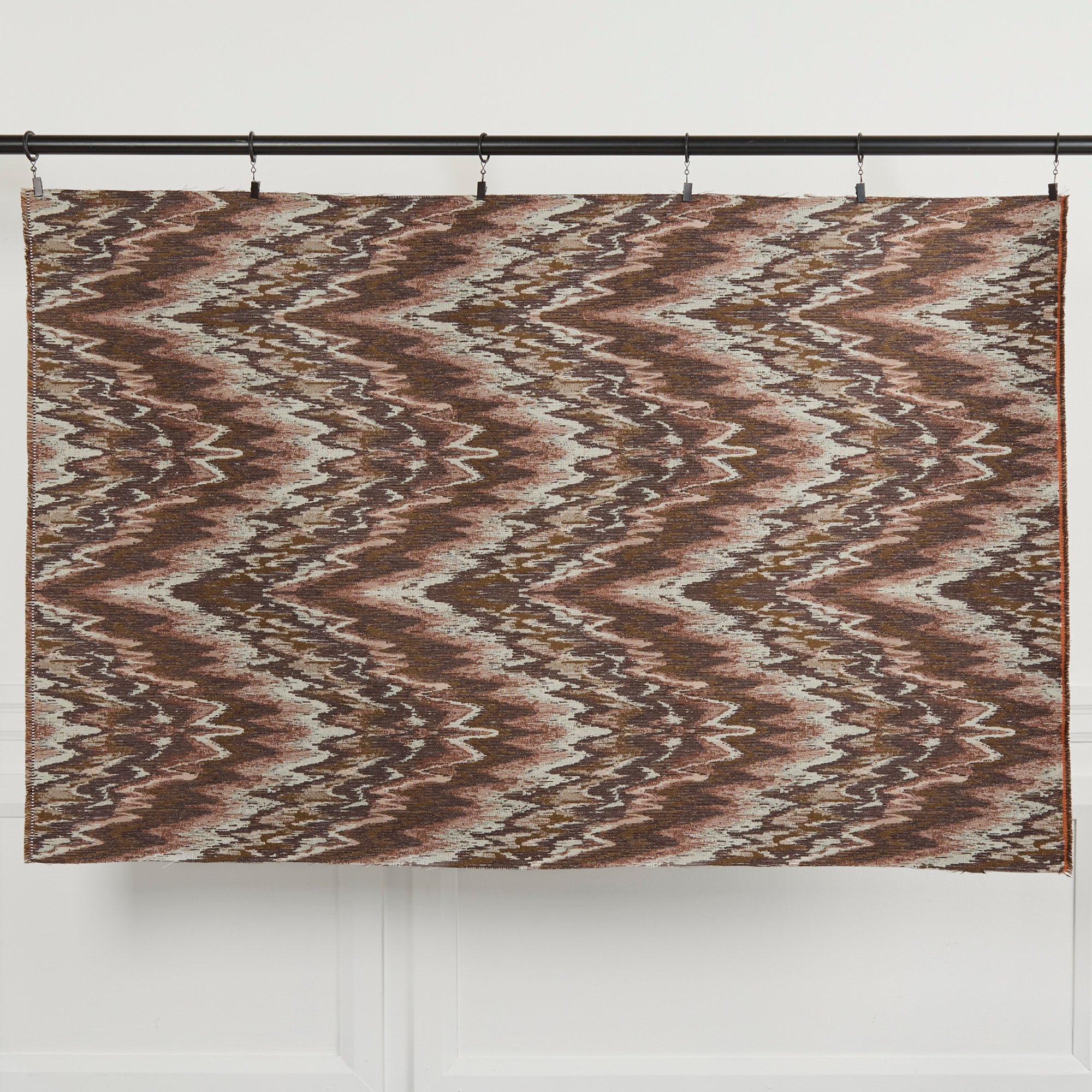 Full yard of Tonic Living Mendoza Fig upholstery fabric hanging to show scale and pattern repeat.