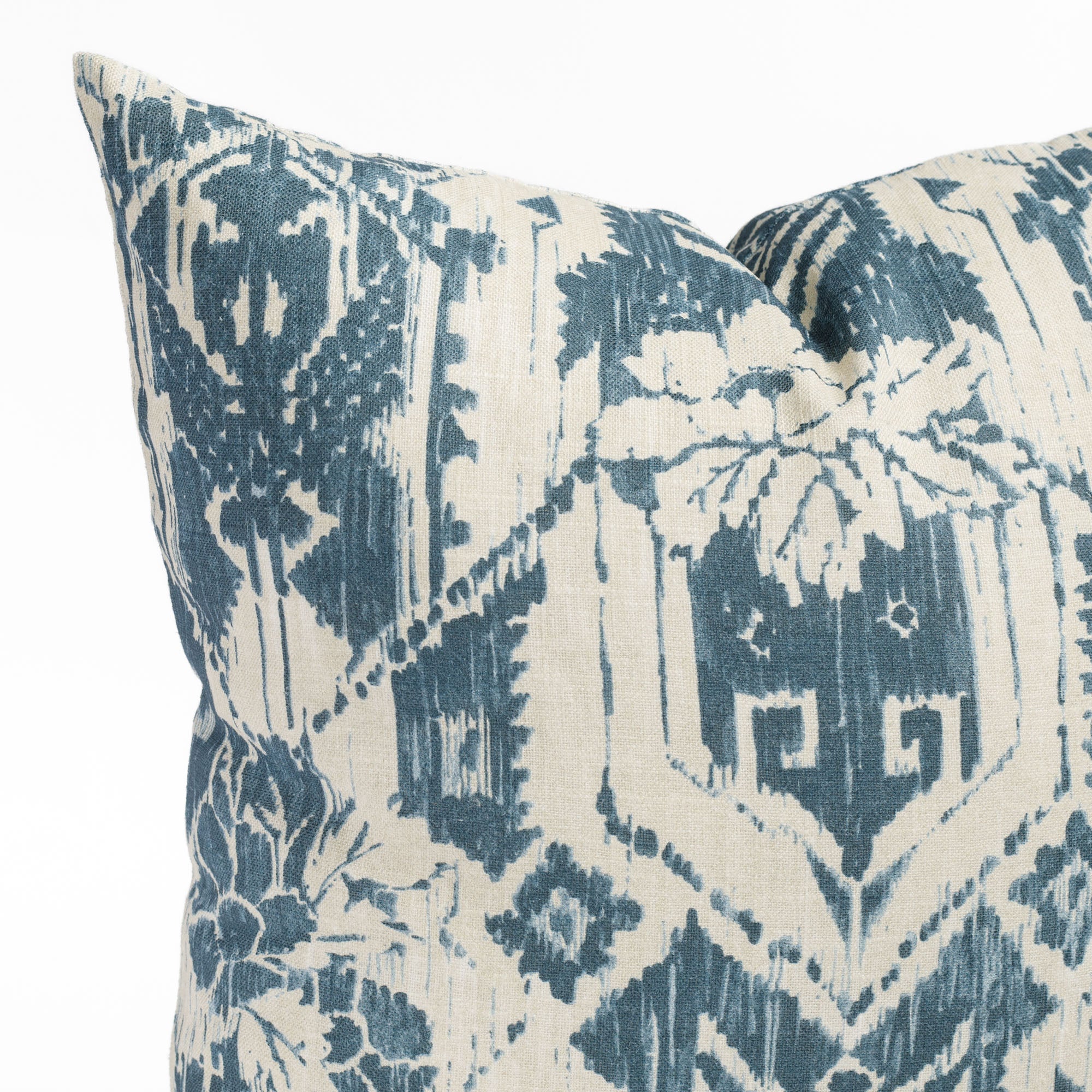 a cream and blue floral ikat : close up view