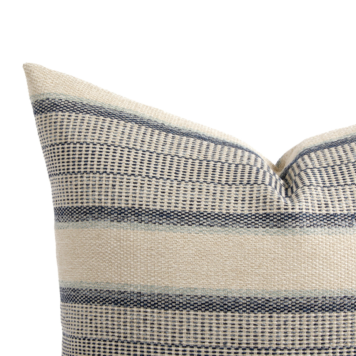 Close up of Tonic Living Miller Stripe Denim pillow showing navy blue, light blue, and beige banded stripes with woven texture.
