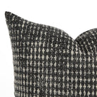Close-up of Otto Domino Pillow by Tonic Living – textured black and white cushion with bold pattern.