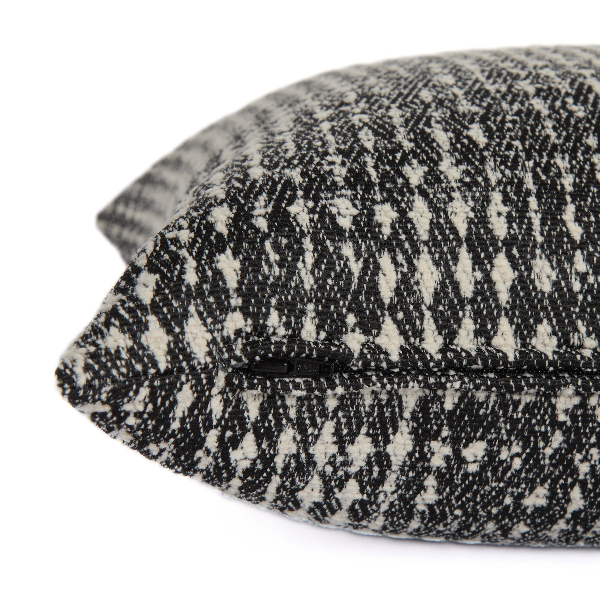 Close-up side zipper view of Otto 20x20 Pillow, Domino by Tonic Living – black and white geometric cushion.