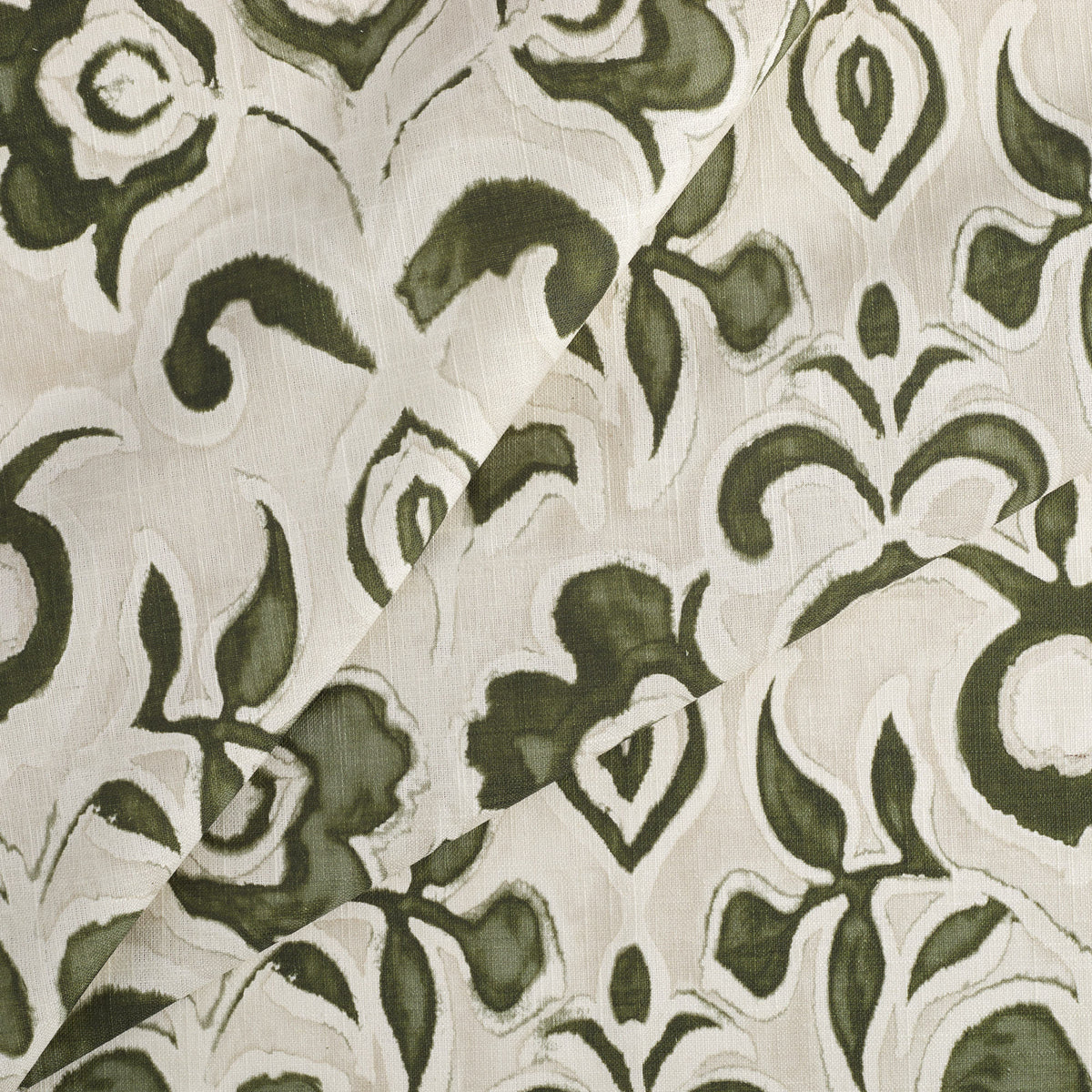 Tonic Living Paloma Olive drapery fabric featuring bold olive green blooms and scrolling leaves on a neutral oatmeal background.