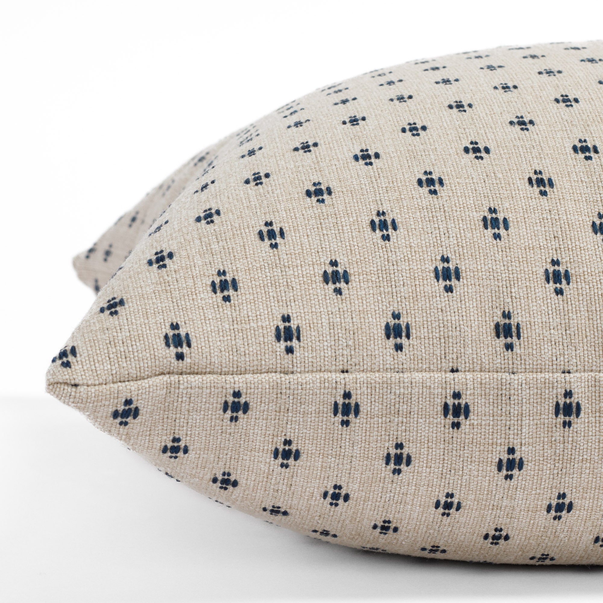 Pierce Navy, a textured traditional pillow from Tonic Living: close up side view.