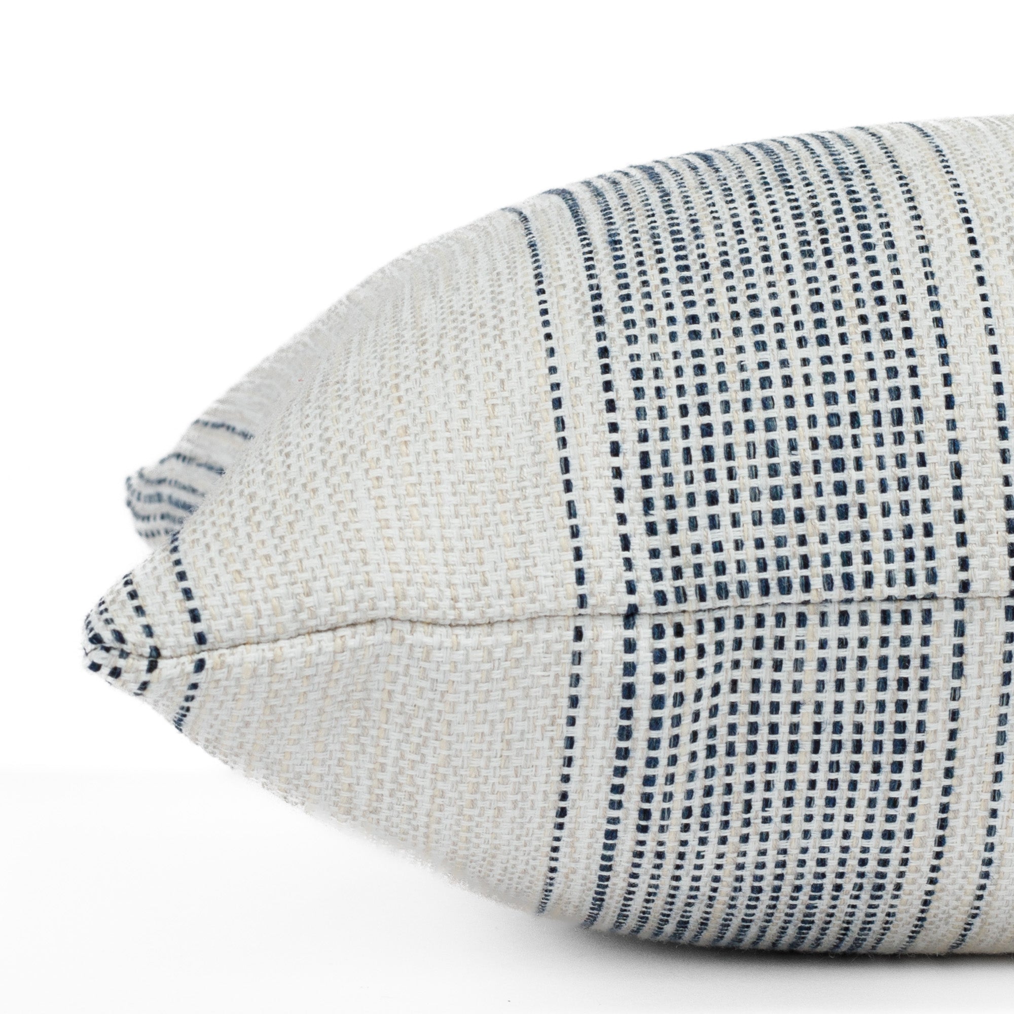 Revitalize Denim blue and beige striped indoor/outdoor throw pillow from Tonic Living, close-up side view.